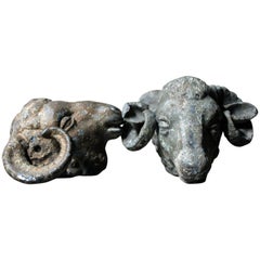 Pair of circa 1800 Painted and Gilded Lead Mounts in the Form of Ram
s Heads