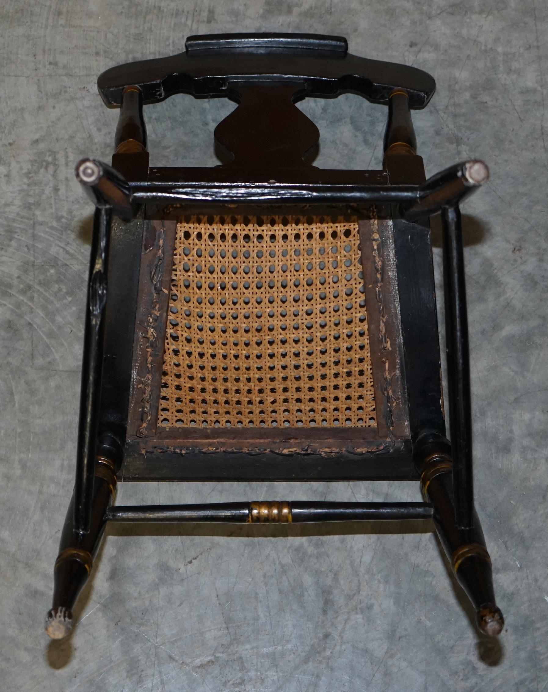 Pair of circa 1825 Georgian Baltimore Ebonised Painted Gilt Bergere Side Chairs For Sale 5