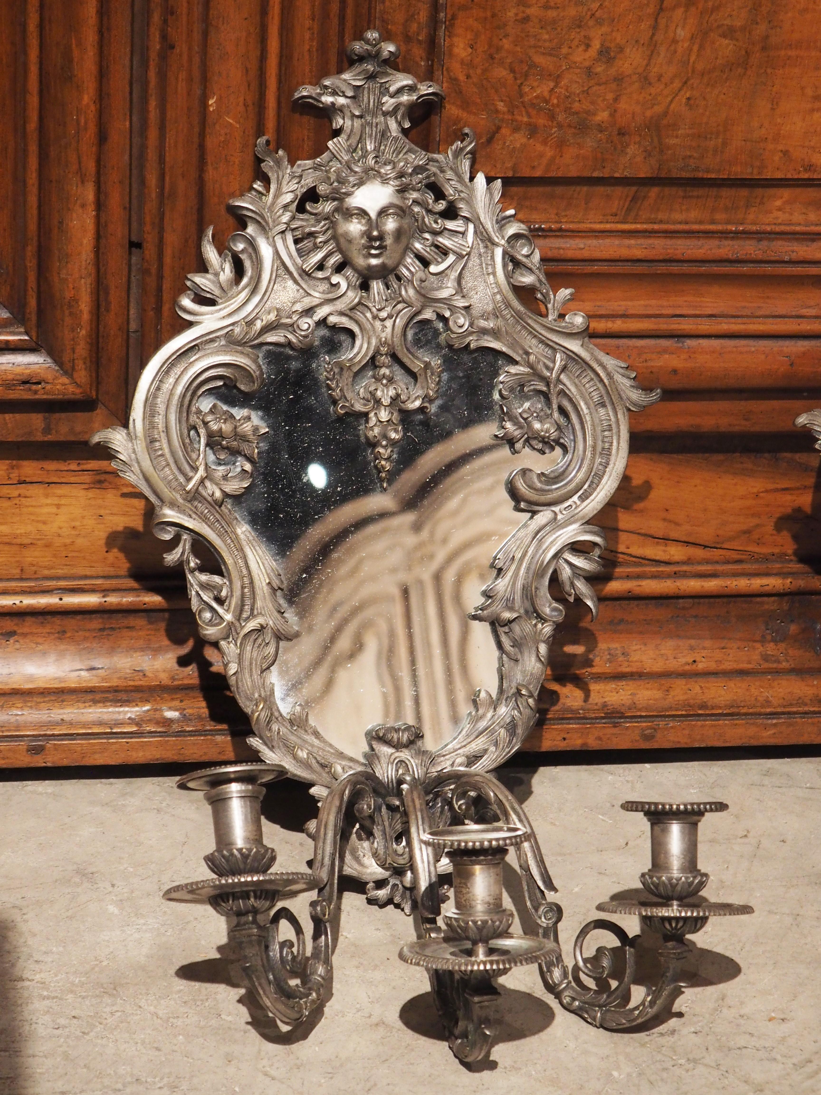 Pair of circa 1850 Régence Style Silvered Bronze Mirrored Sconces from France In Good Condition For Sale In Dallas, TX