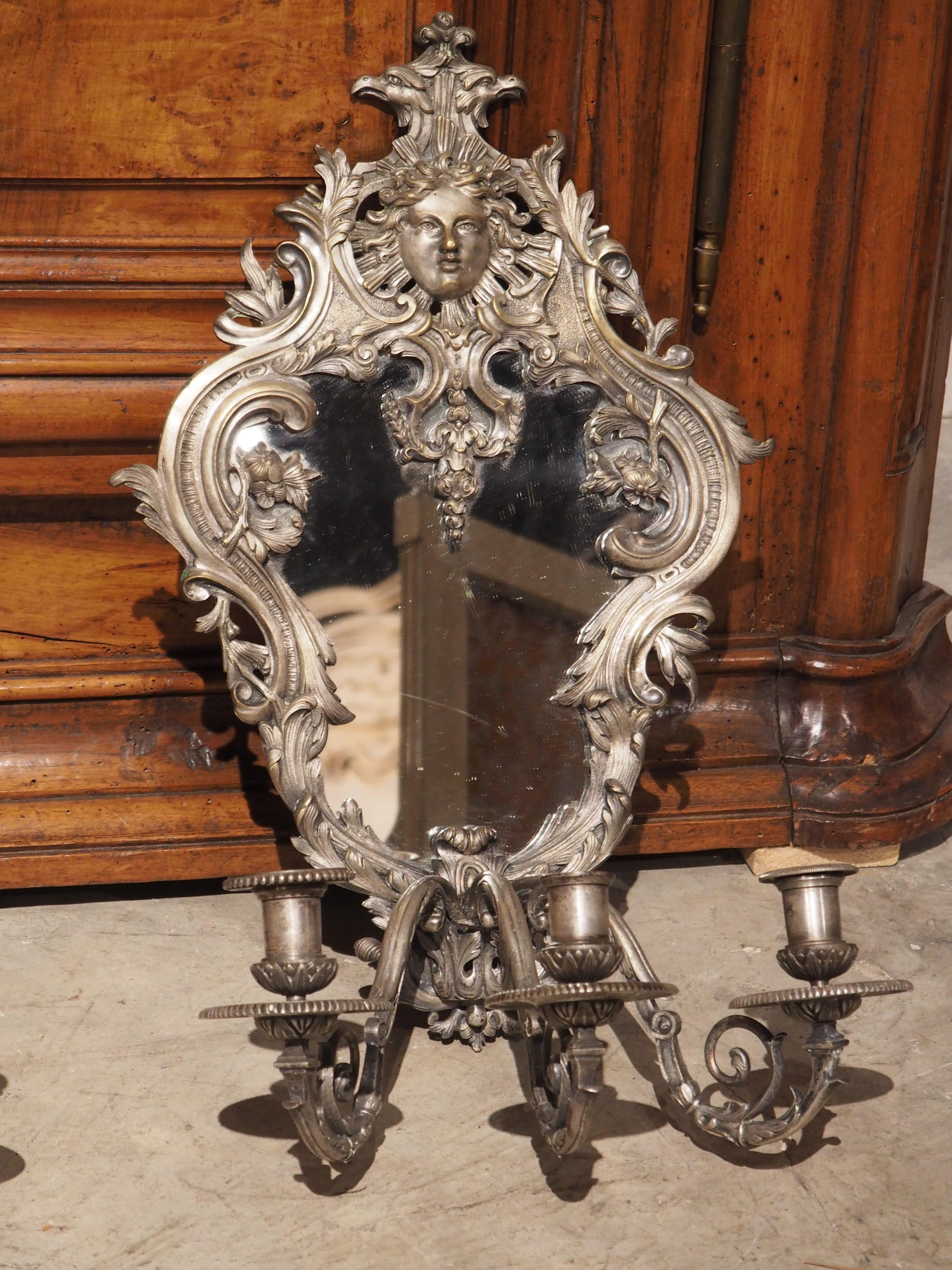 Mid-19th Century Pair of circa 1850 Régence Style Silvered Bronze Mirrored Sconces from France For Sale