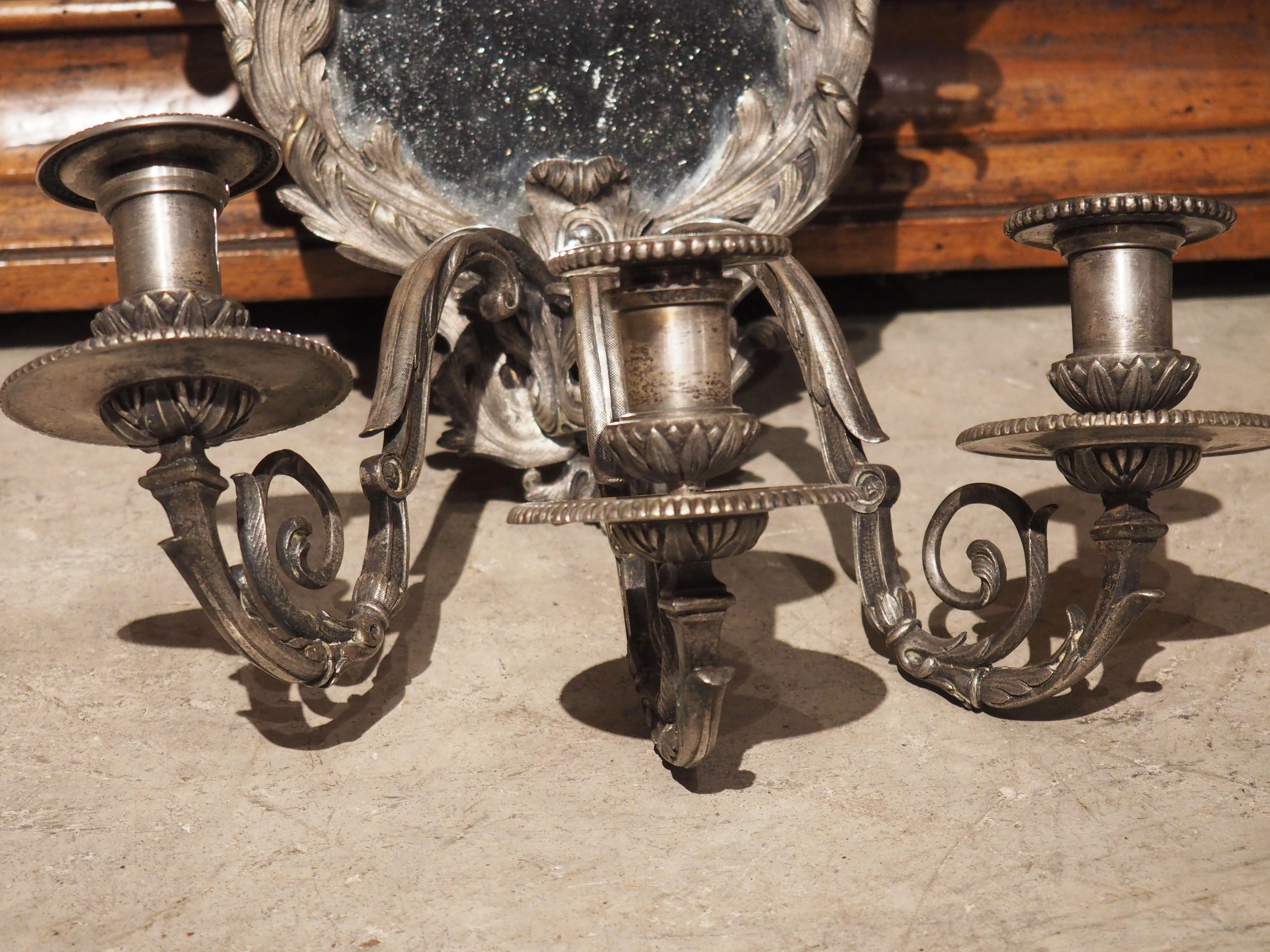 Metal Pair of circa 1850 Régence Style Silvered Bronze Mirrored Sconces from France For Sale