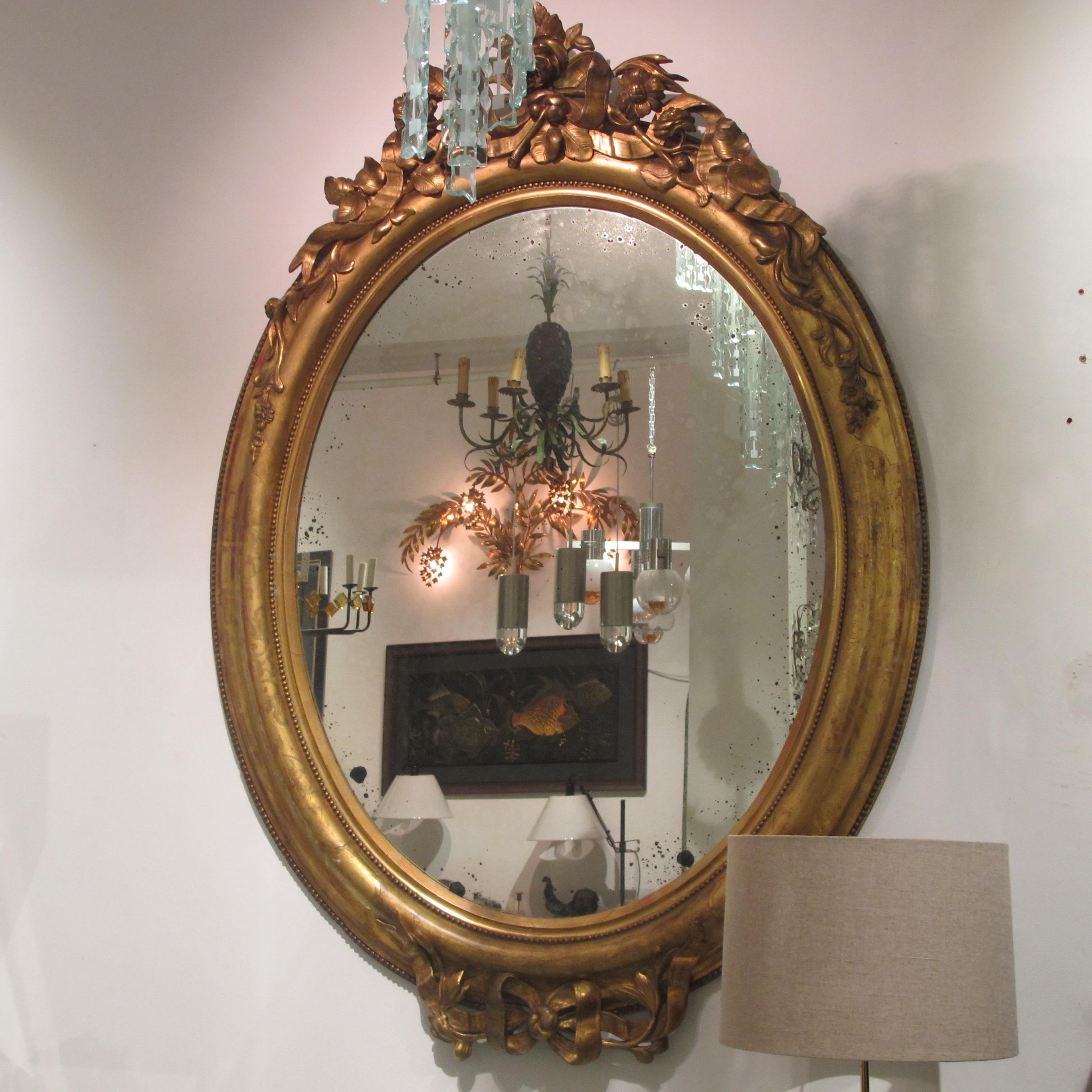 Mid-19th Century Pair of circa 1860 Large French Napoleon III Large Carved Gilt Oval Mirrors
