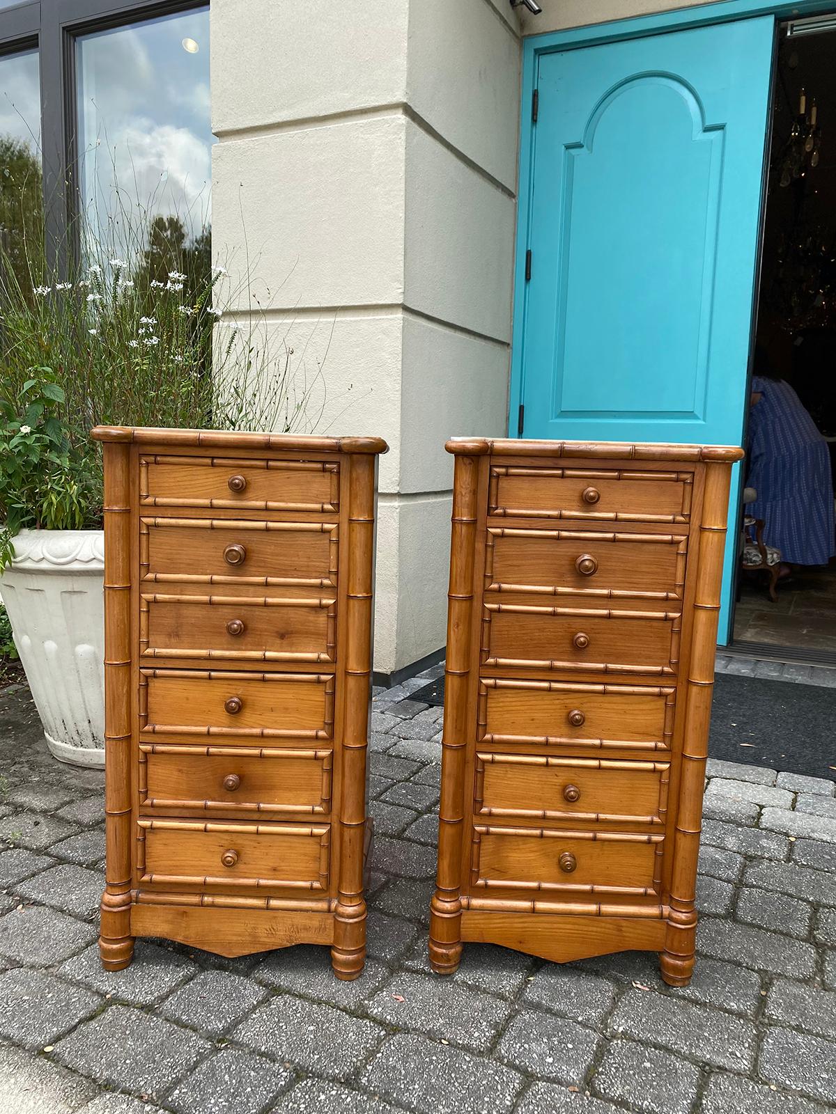 Pair of Circa 1880 French faux bamboo bedside commodes with inset marble tops
4 Drawers, the 2nd pull from the top opens down to reveal storage - not a drawer.