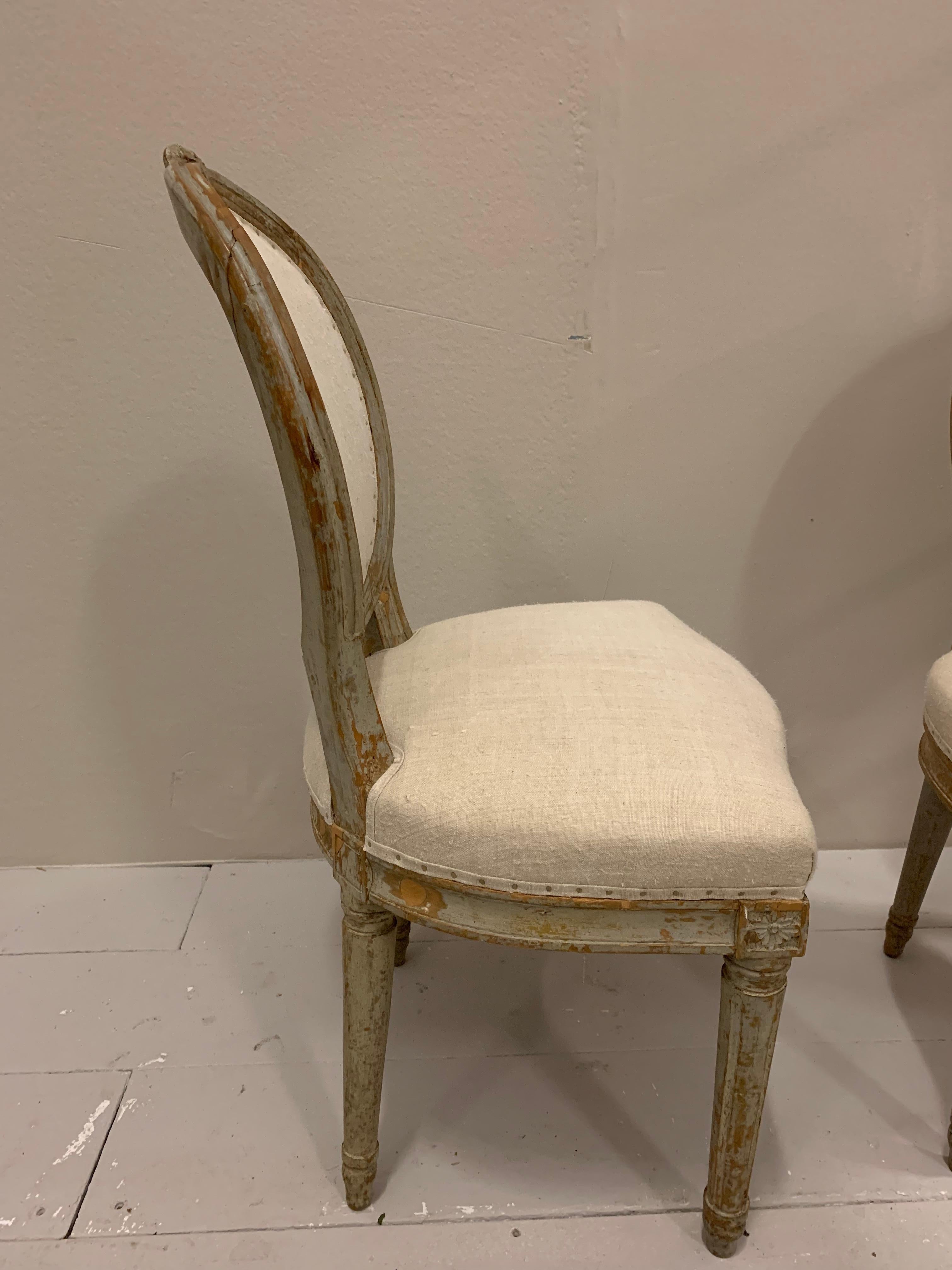Fabric Pair of circa 18th Century Swedish Gustavian Side Chairs with Carved Flowers For Sale