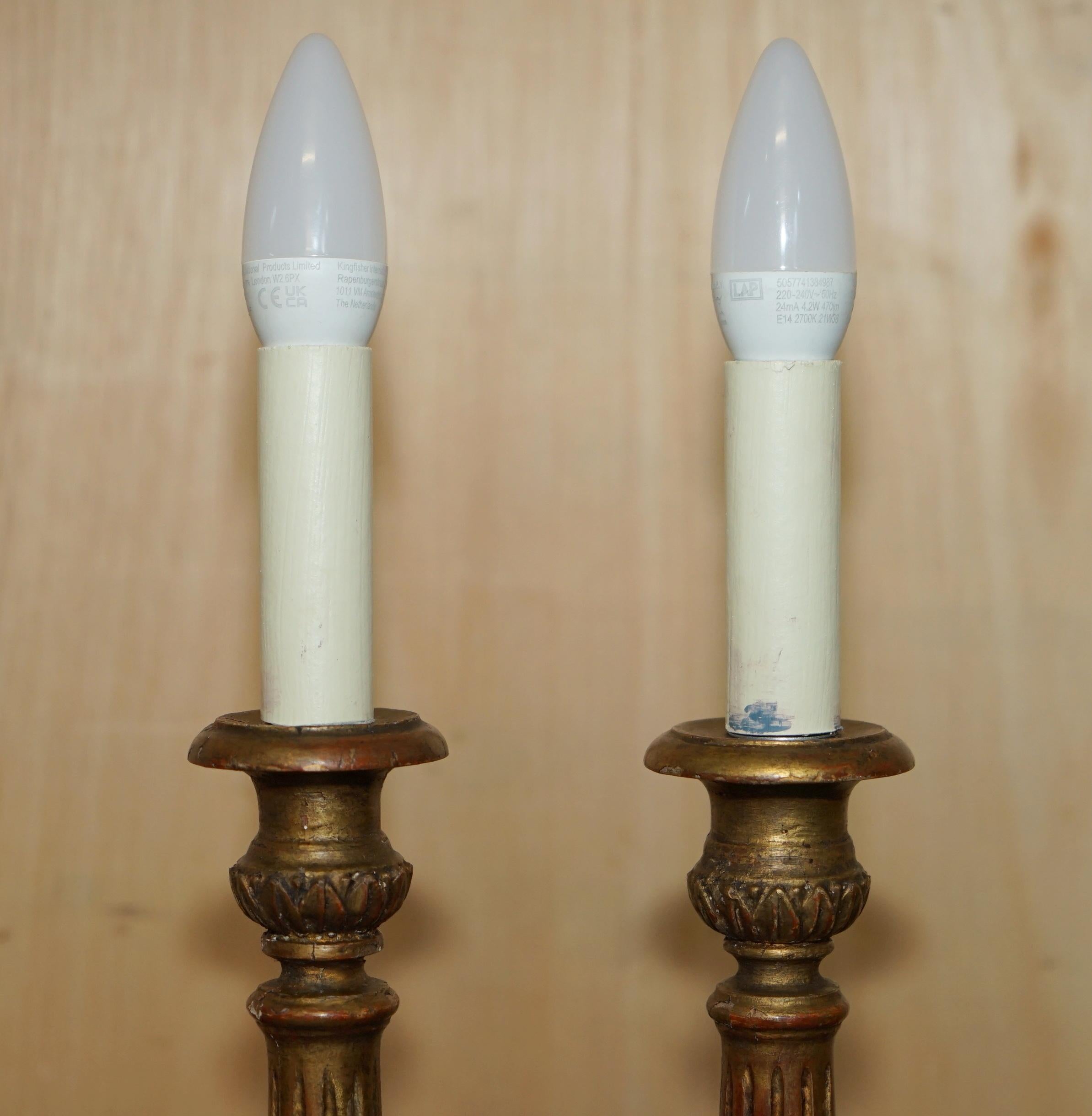 Royal House Antiques

Royal House Antiques is delighted to offer for sale this stunning pair of vintage Corinthian Pillar table lamps which are circa 1900 and converted from very old candle holders 

Please note the delivery fee listed is just a
