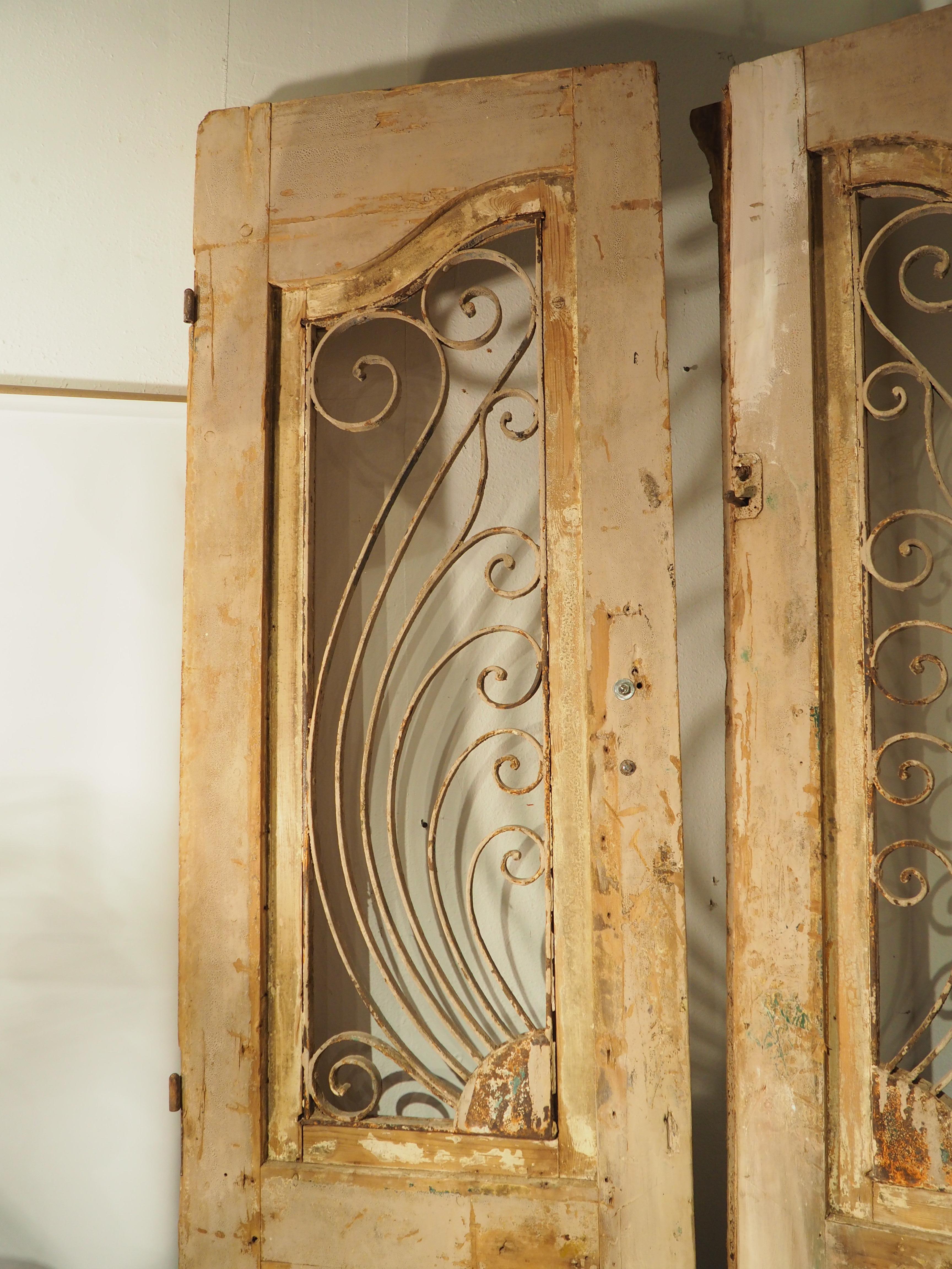 The style of design known as Art Nouveau (roughly 1890-1914), was heavily inspired by nature, resulting in lively furnishings and architecture. A stunning example from this period is our pair of wood and iron doors, hand-carved in France, circa