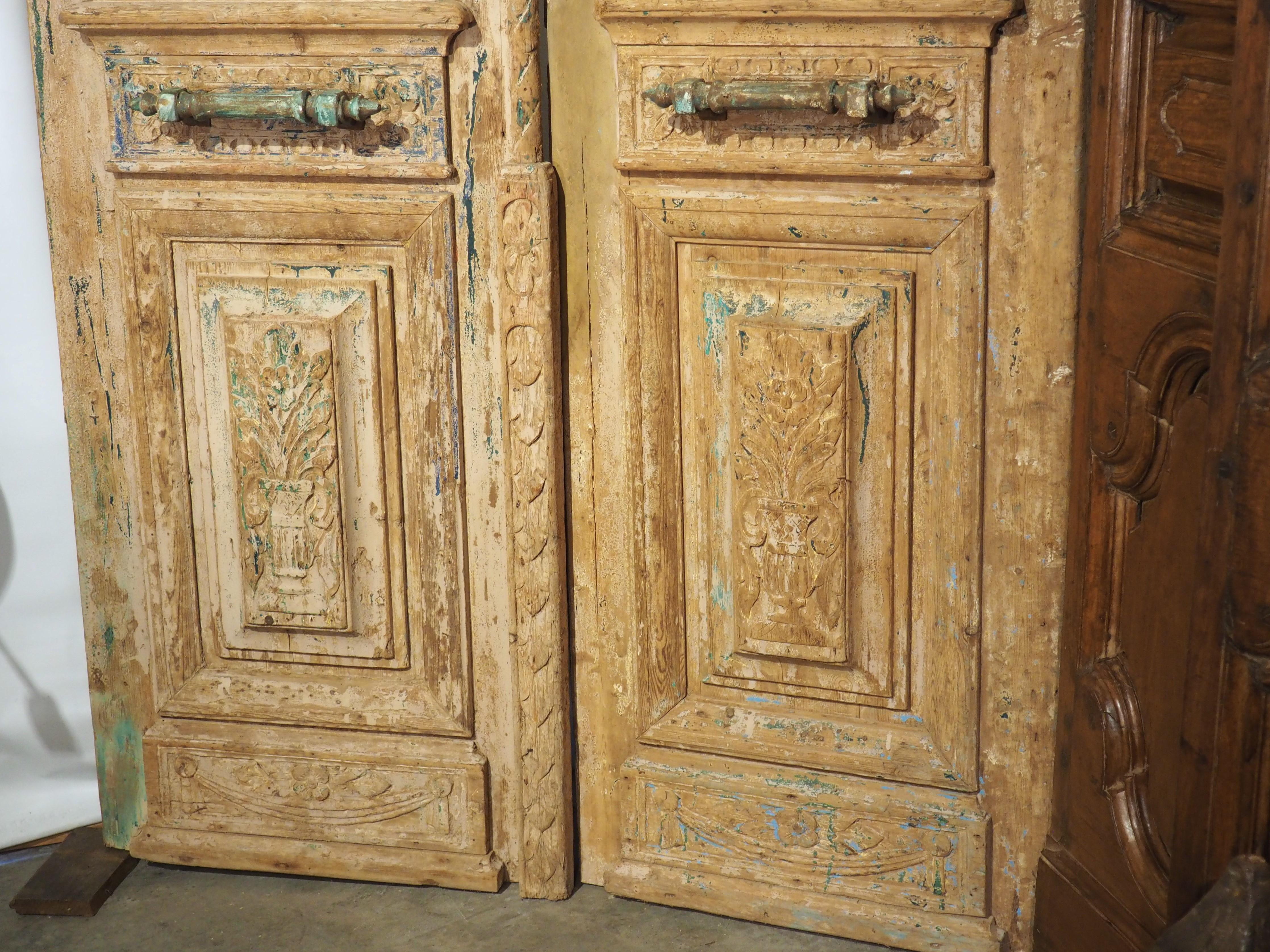 Hand-Carved Pair of Circa 1900 French Art Nouveau Wood and Iron Doors For Sale