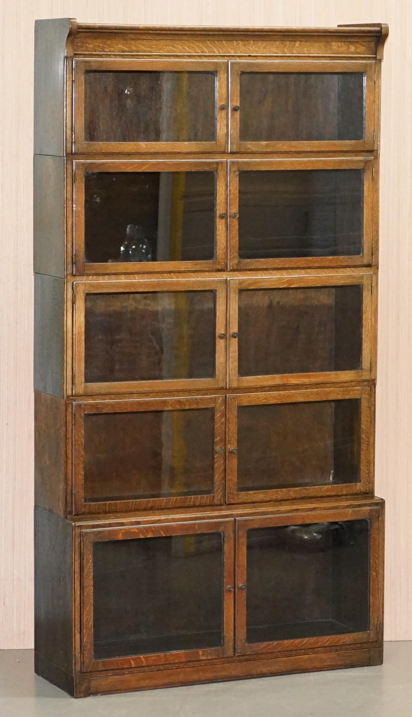 We are delighted to offer for sale this lovely pair of early circa 1900 Minty oxford stacking legal bookcases in solid oak 

A very good looking and well-made piece, there were a number of companies making this type of bookcase in the late