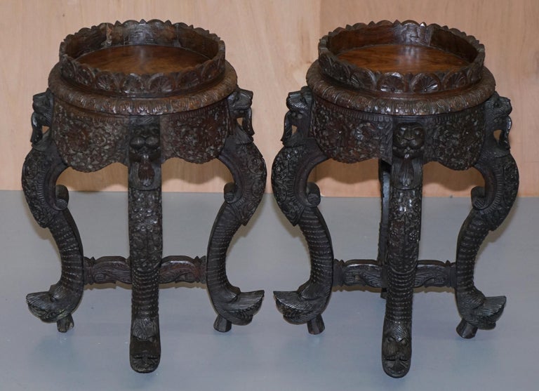 We are delighted to offer for sale this lovely pair of original Burmese hand carved wood plant Jardinière stands with lion bird and floral detailing

A very good looking and decorative pair, extremely primitive yet highly detailed by design, they