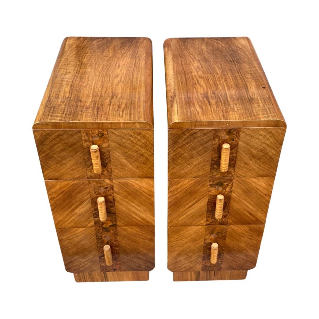 Absolutely beautiful pair of mid 1930’s bedside cabinets. A matching pair each with rounded tops and matching bases giving a very distinctive curvaceous feel. These are a really lovely honey colour with beautiful longitudinal grain running front to