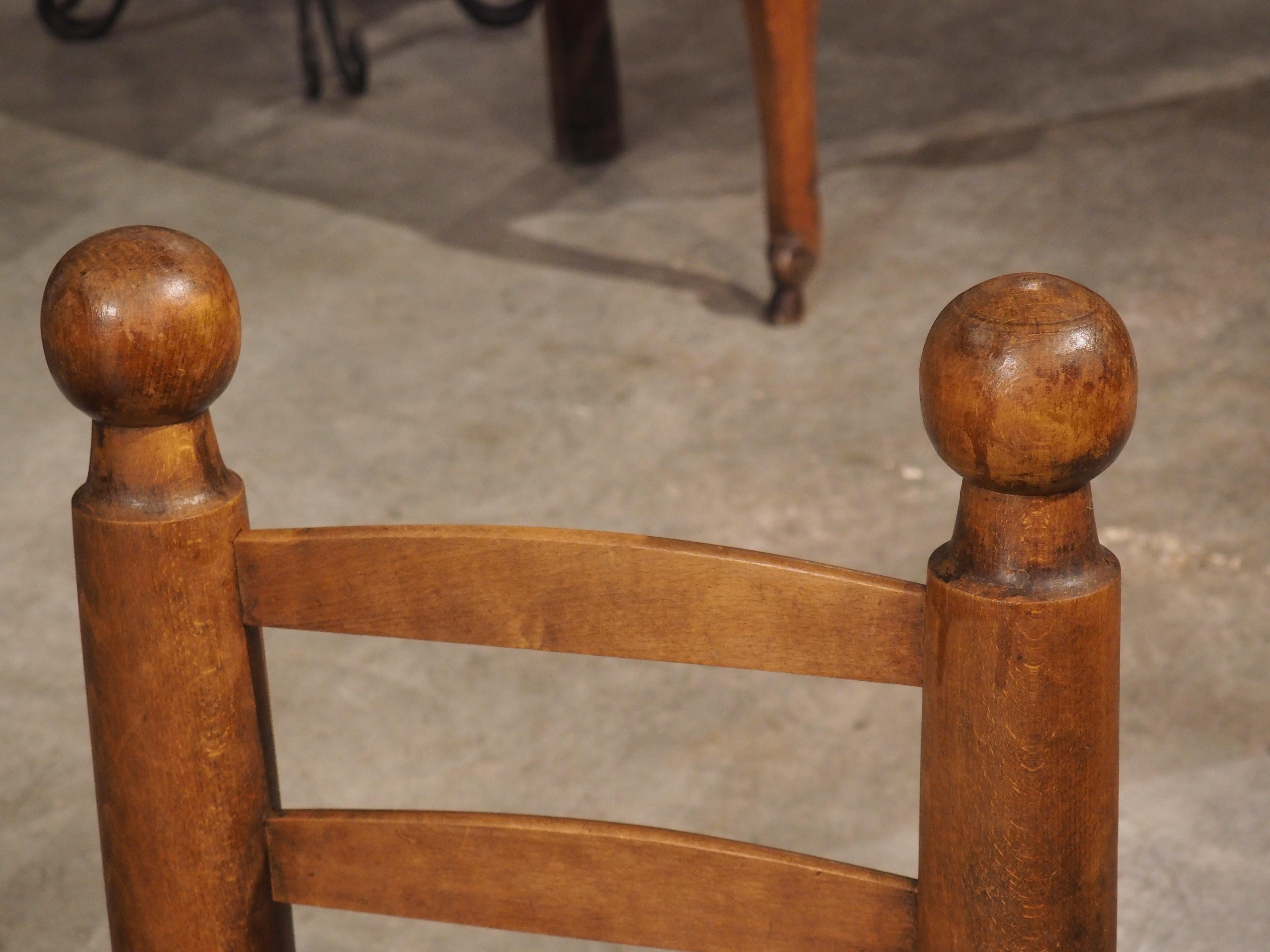 Hand-Carved Pair of Circa 1940 French Low Fireplace Chairs in Carved Beech and Rush For Sale