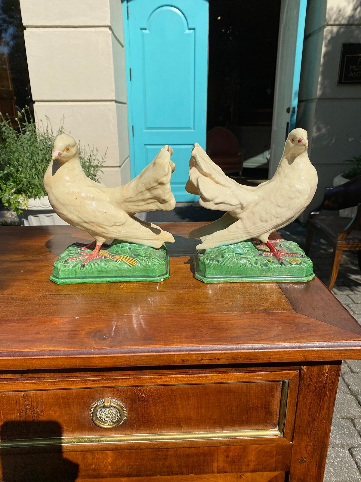 Pair of Circa 1960 Portuguese Faience Doves, marked 'Made in Portugal', labeled Hall House New York.