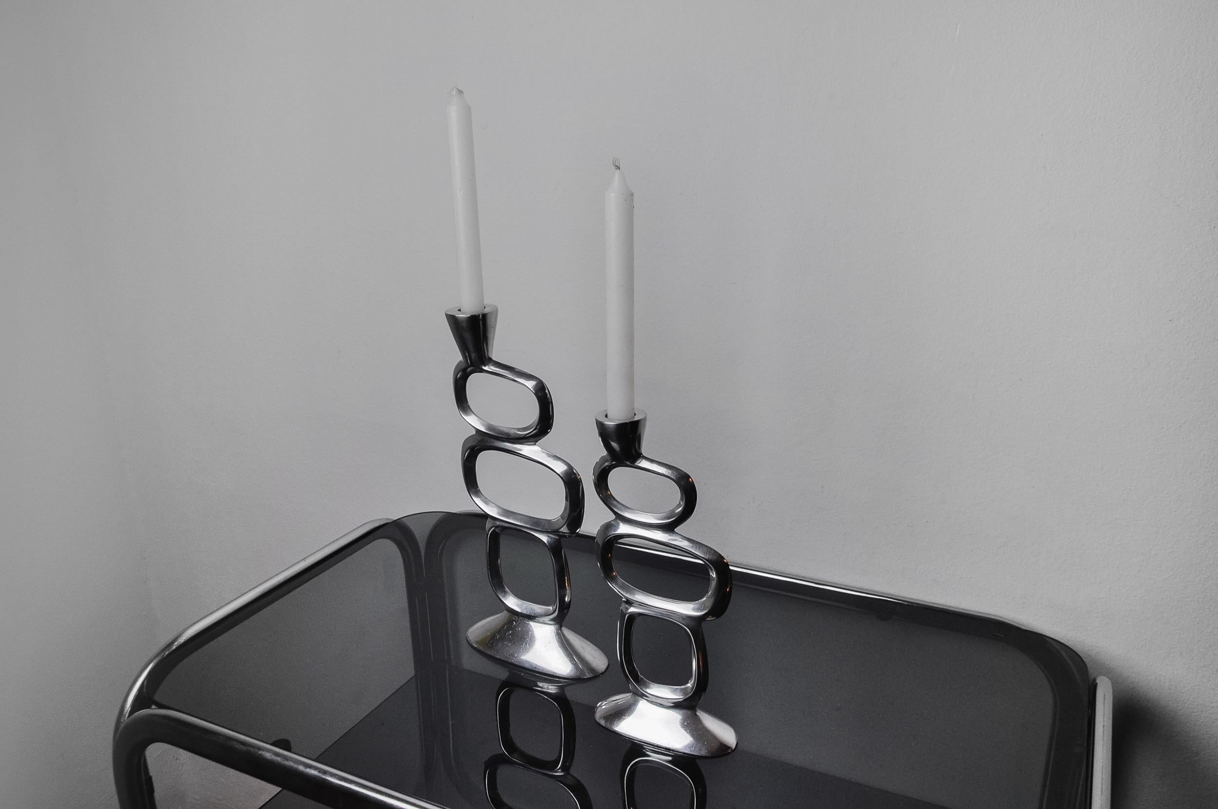 English Pair of circle candlesticks by Matthew Hilton, England, 1980 For Sale