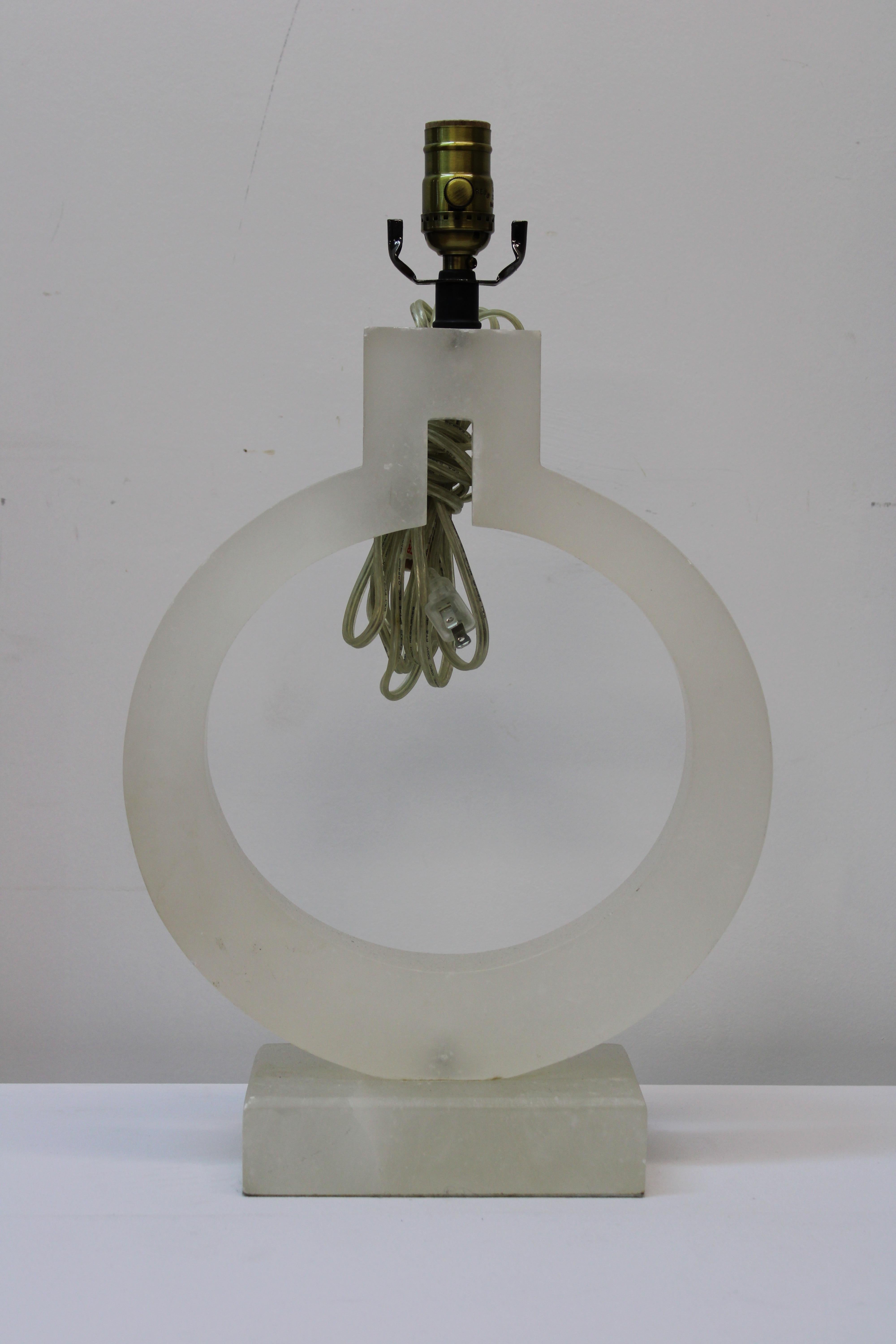 C. Mid 20th Century

Circular Alabaster table lamps.