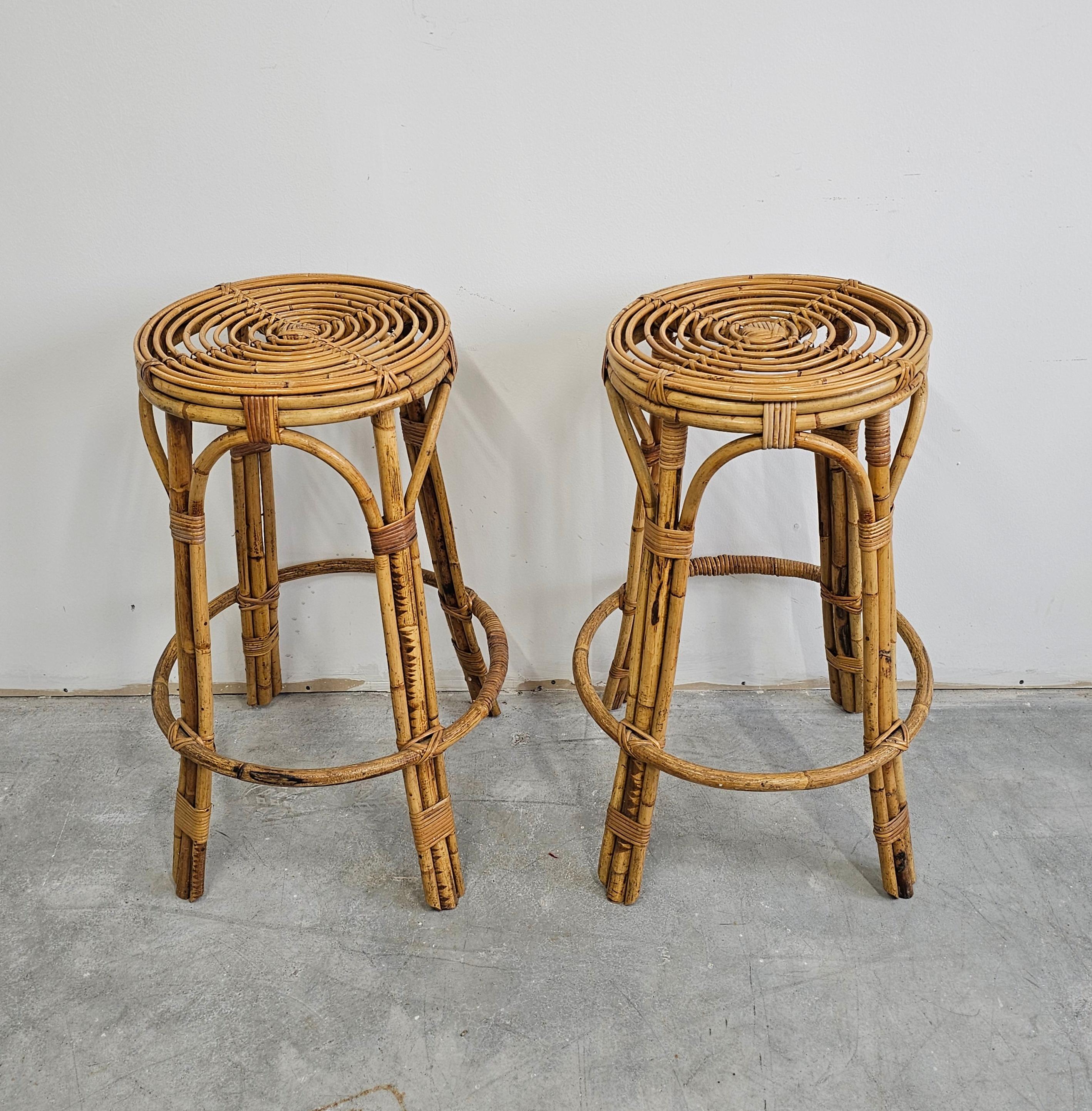 In this listing you will find a pair of beautiful vintage bamboo stools. They feature circular seats, completely made of bamboo, as well as a footrest. Made in Italy in 1960s.

Very good vintage condition with some signs of time and use. 

When