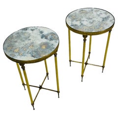 Paire de tables d'appoint circulaires en laiton et miroir oxydé