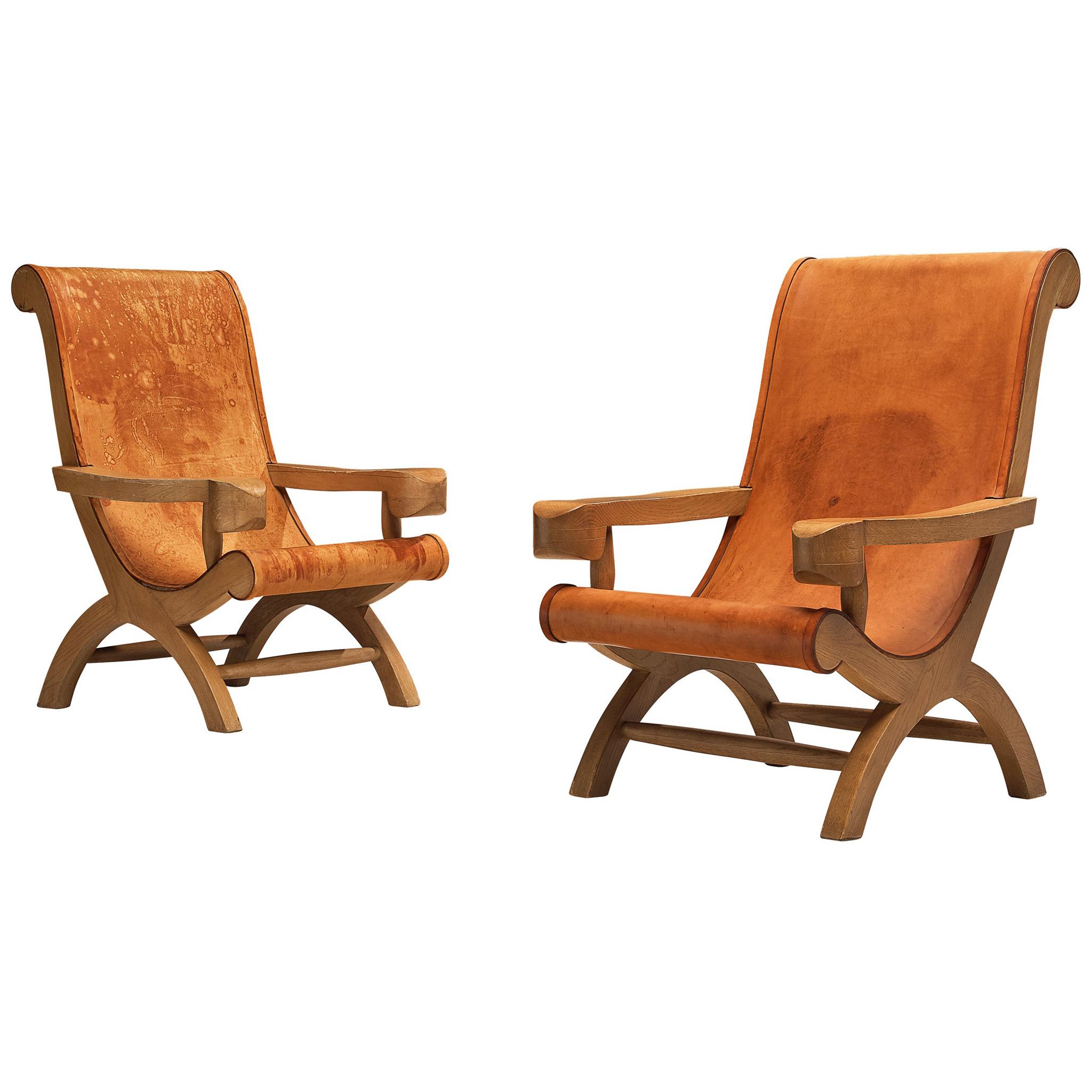 Pair of Clara Porset Lounge Chairs 'Butaque' in Original Patinated Leather