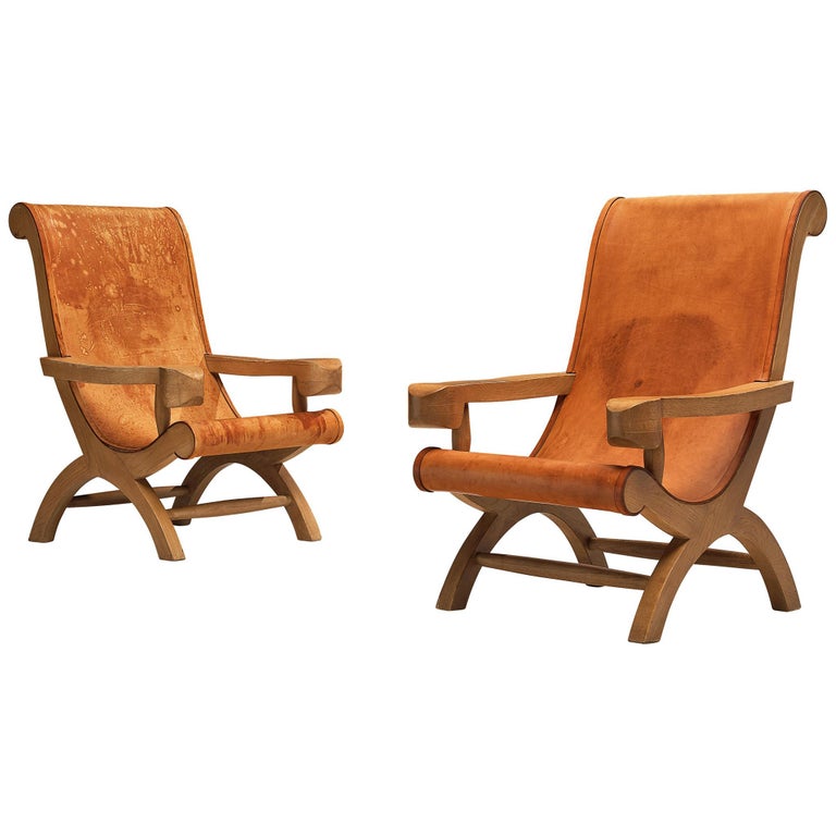 Pair of Clara Porset Lounge Chairs 'Butaque' in Original Patinated Leather For Sale
