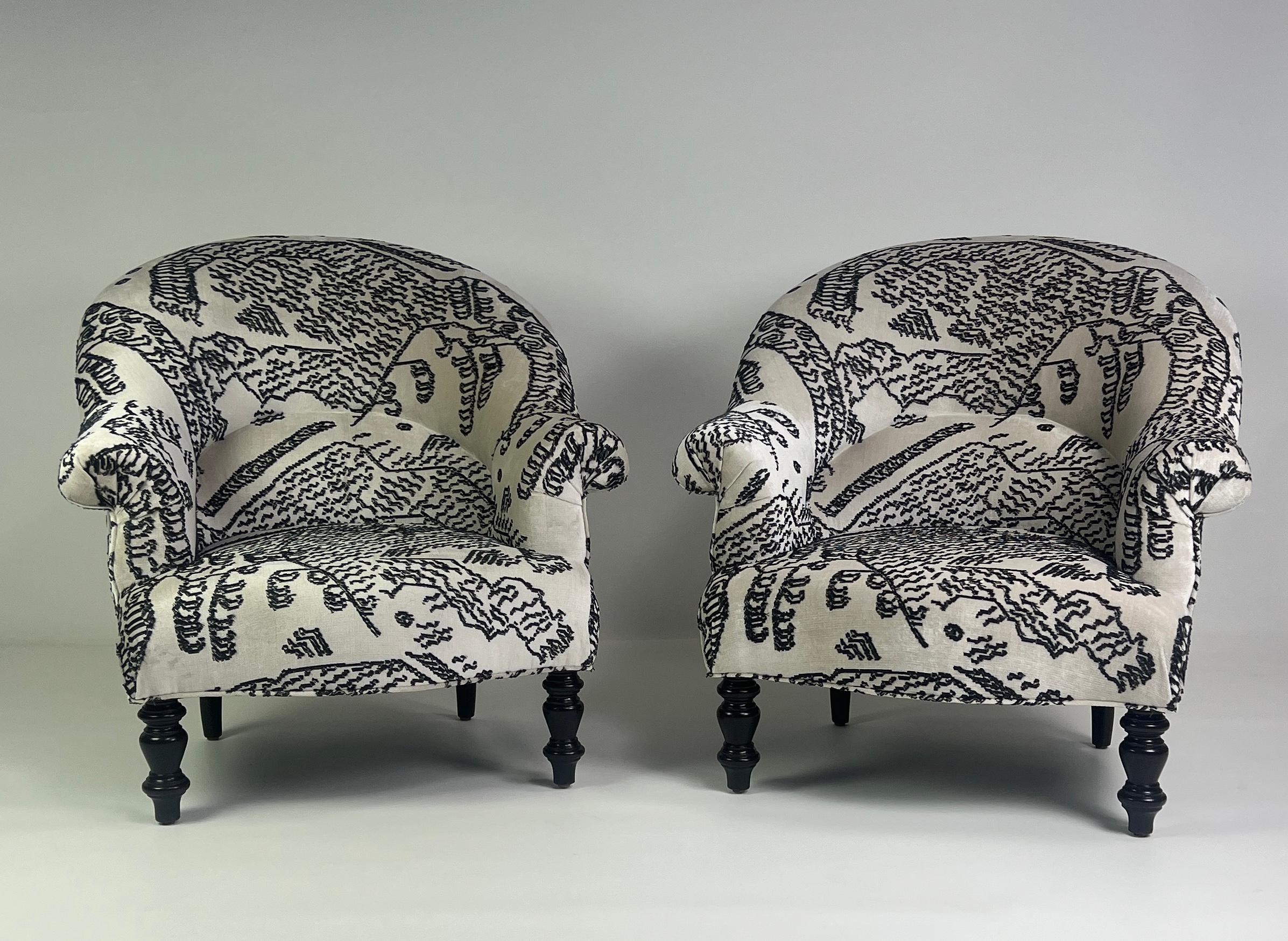 Two Napoleon III armchairs upholstered with Dedar Tiger Mountain Velvet. Turned wooden legs with dark walnut finish.
