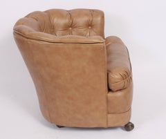 Pair of Rolling Classic Leather Inc. Tufted Taupe Barrel Club Chairs, 1970s