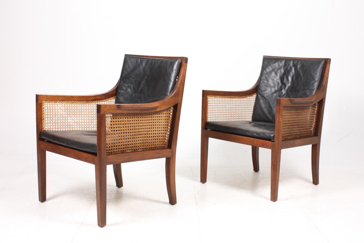 Mid-20th Century Pair of Classic Lounge Chairs in Mahogany and French Cane, Made in Denmark 1940s