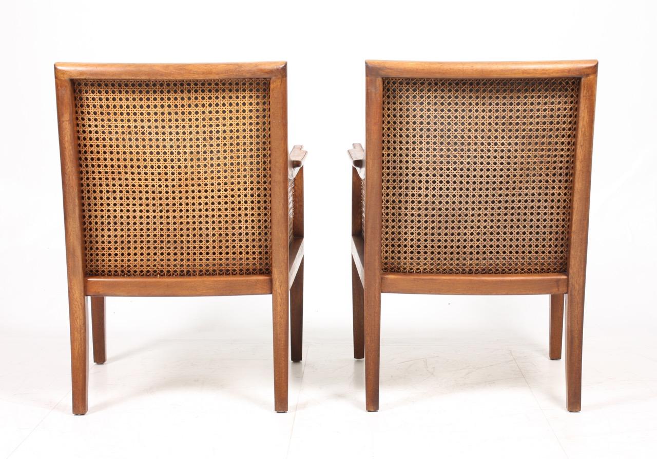 Pair of Classic Lounge Chairs in Mahogany and French Cane, Made in Denmark 1940s 2