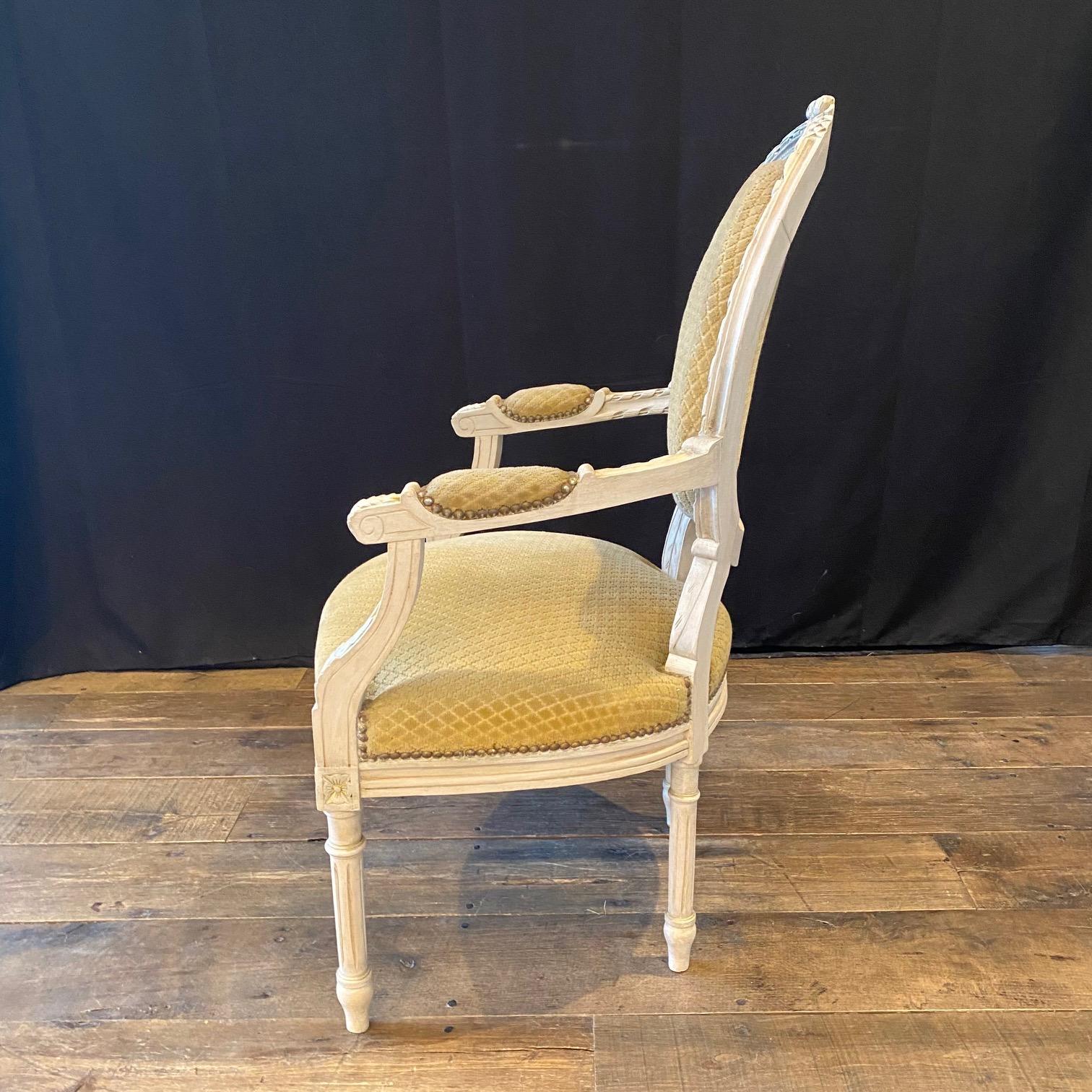 Pair of Classic Painted French Carved Louis XVI Arm Chairs or Fauteuils 1