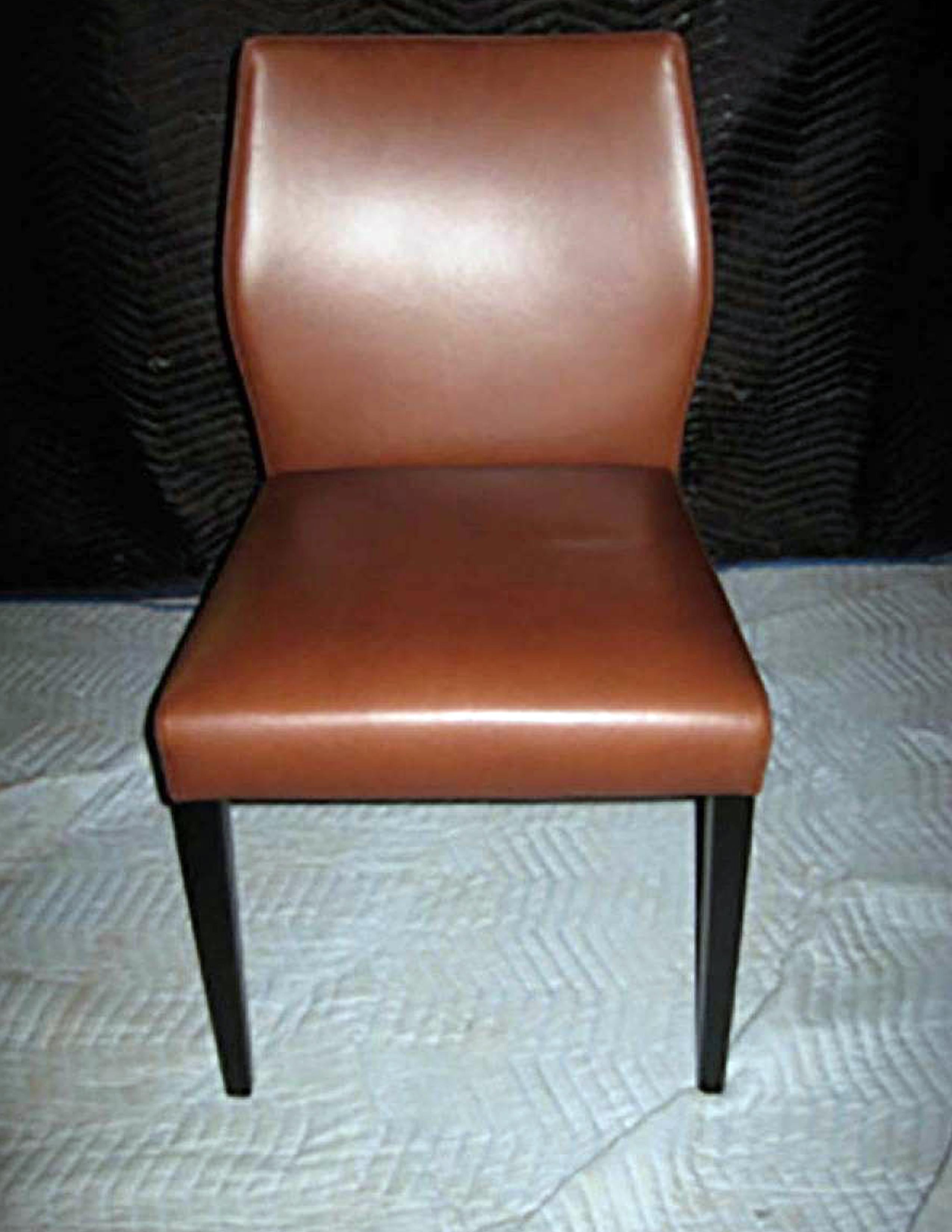 Side chairs in Genuin leather #1211 Mokka with black stained legs 18.50