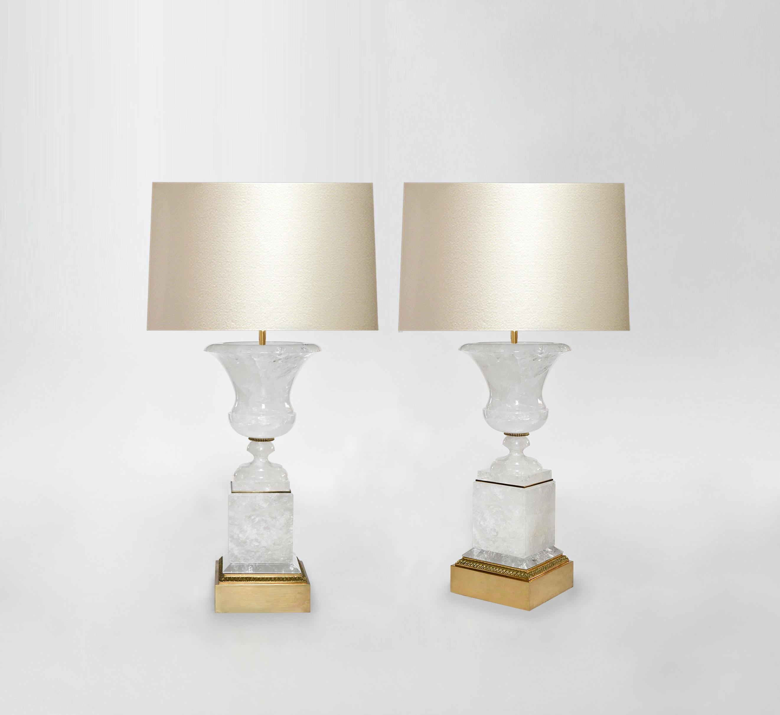 Pair of classic urn form rock crystal lamps with fine cast brass decoration.
To the top of rack crystal: 18