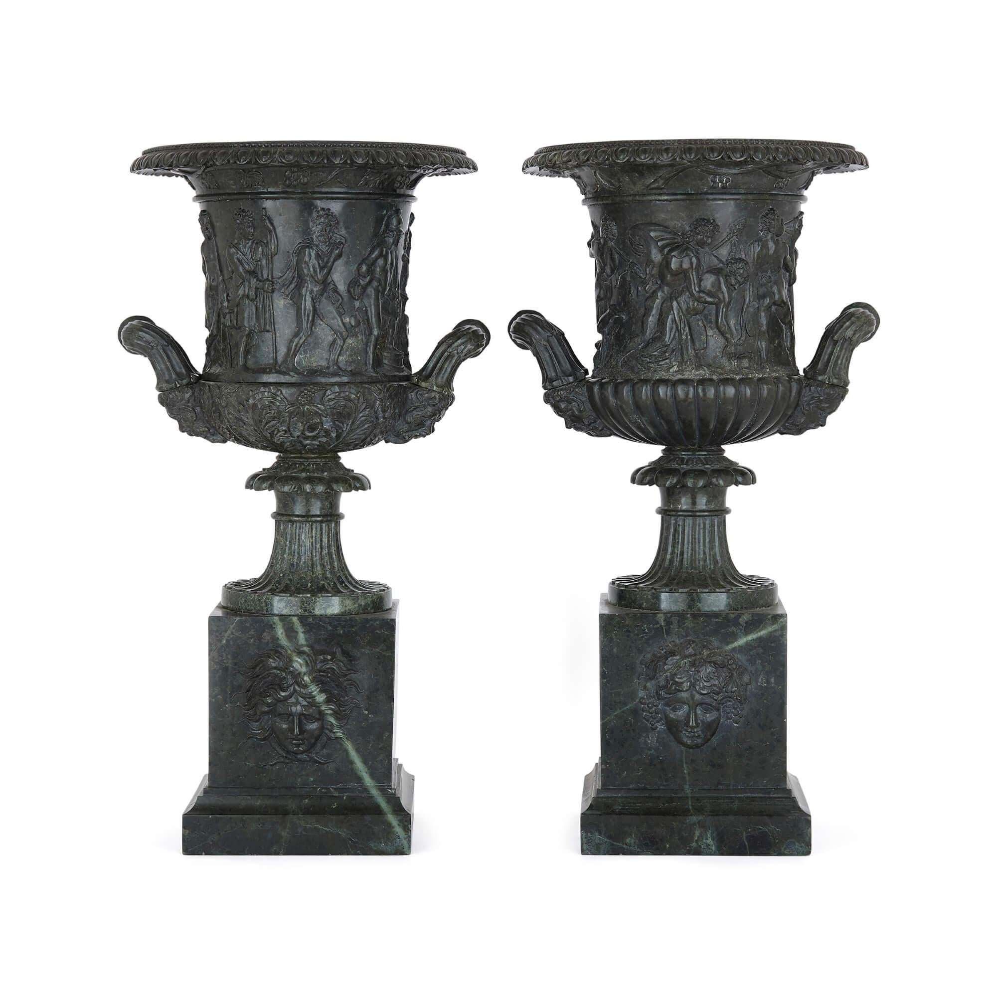 Pair of classical Italian grey marble vases after the famous Medici vase
Italian, 19th Century
Measures: Height 51cm, width 26cm, depth 25cm

These exceptional vases are carved from dark greenish marble in a classical style. Each vase is