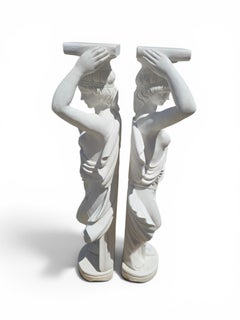 Pair of Classical Italian Marble Pedestals with Sculpted Figures
