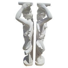 Pair of Classical Italian Marble Pedestals with Sculpted Figures