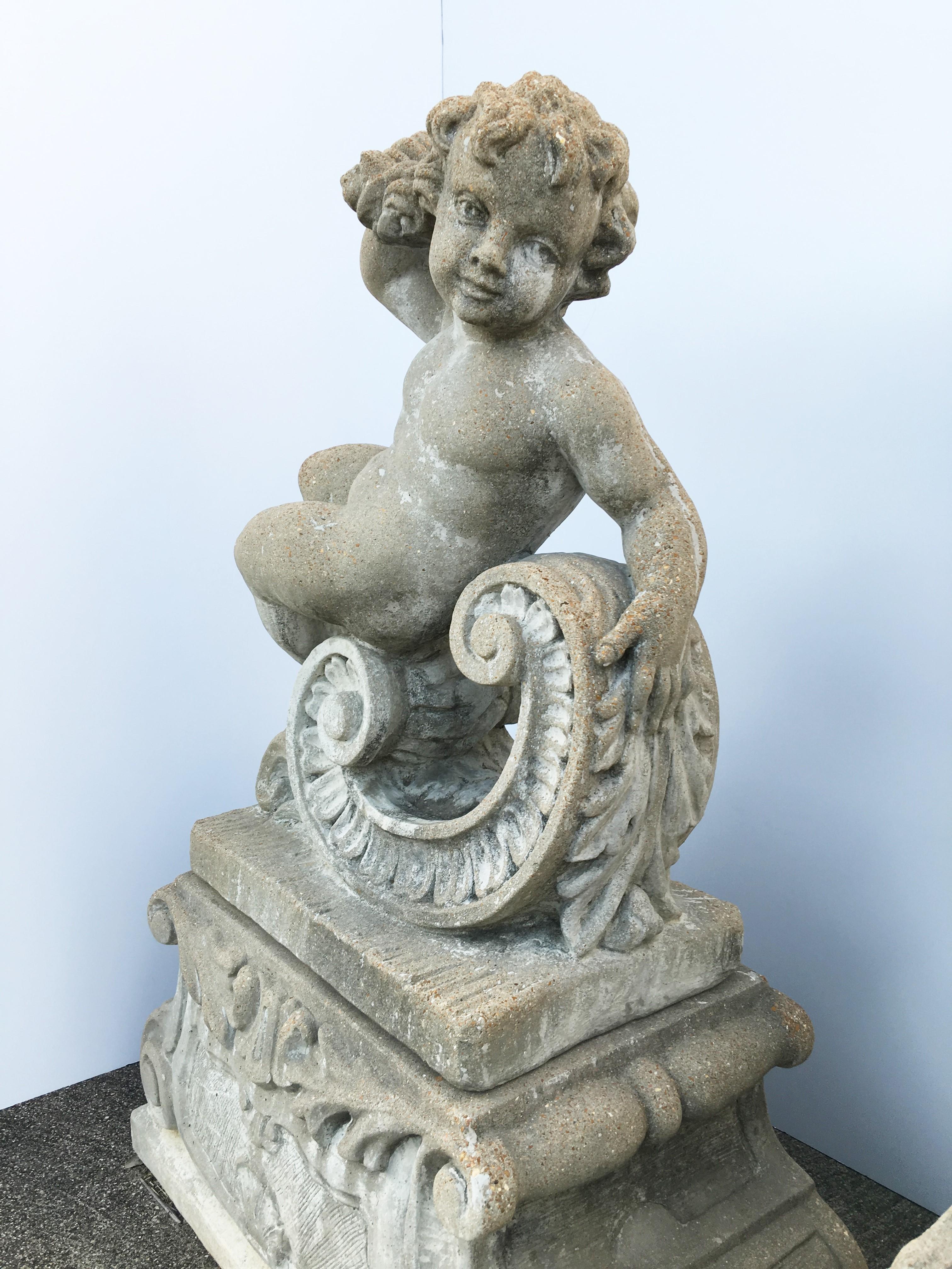 Pair of Classical Stone Composite Putti Garden Statues Holding Roses and Cloth For Sale 4