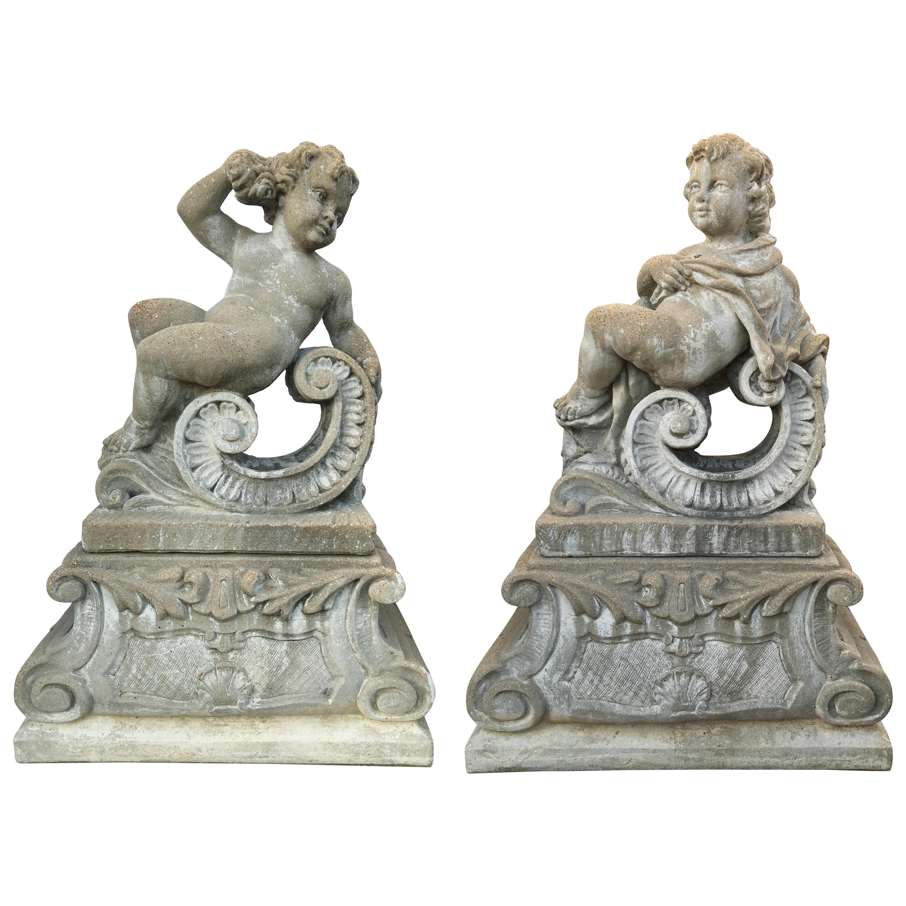 Pair of Classical Stone Composite Putti Garden Statues Holding Roses and Cloth