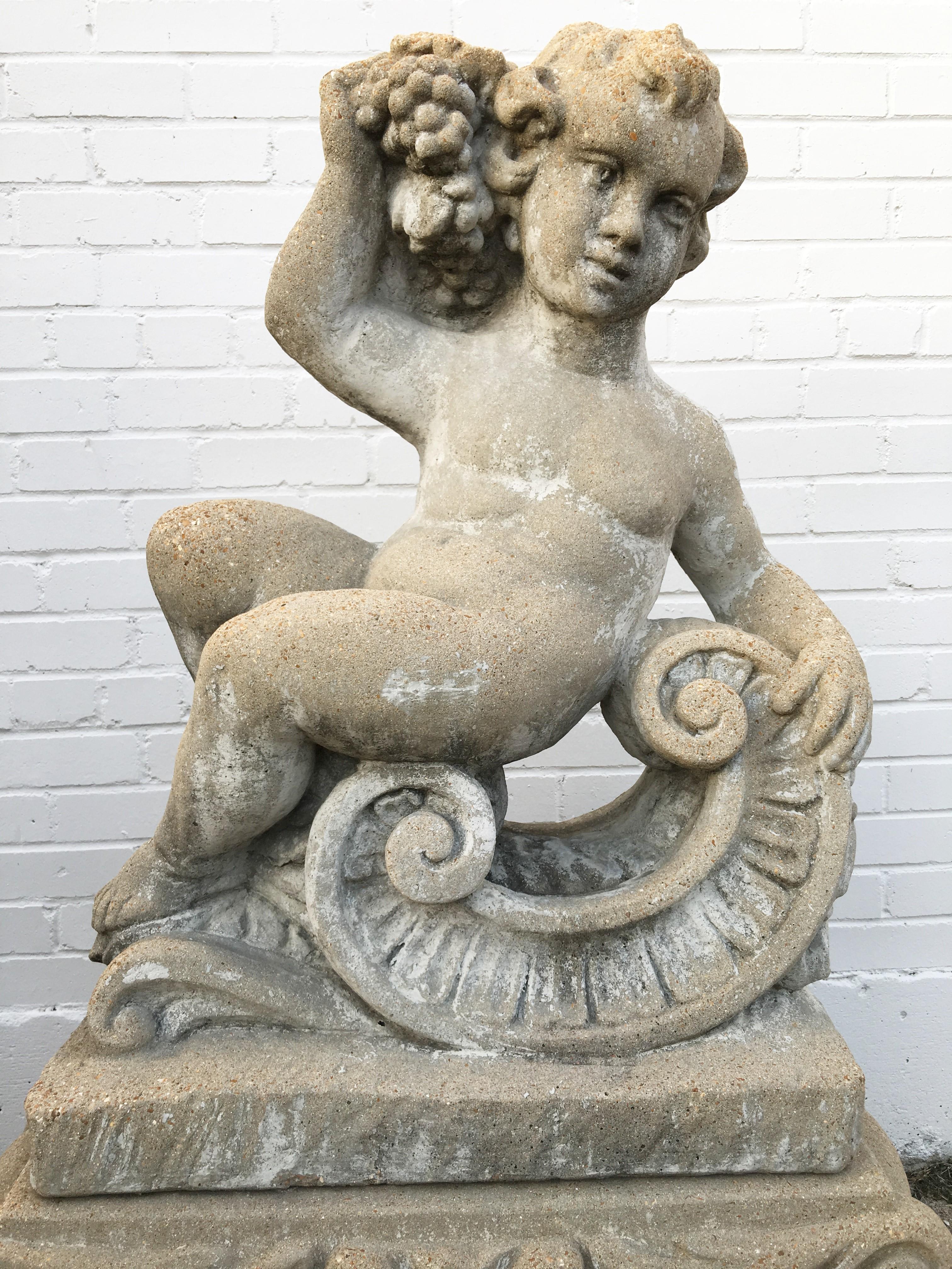 20th Century Pair of Classical Stone Composite Putti Garden Statues Holding Wheat and Grapes For Sale