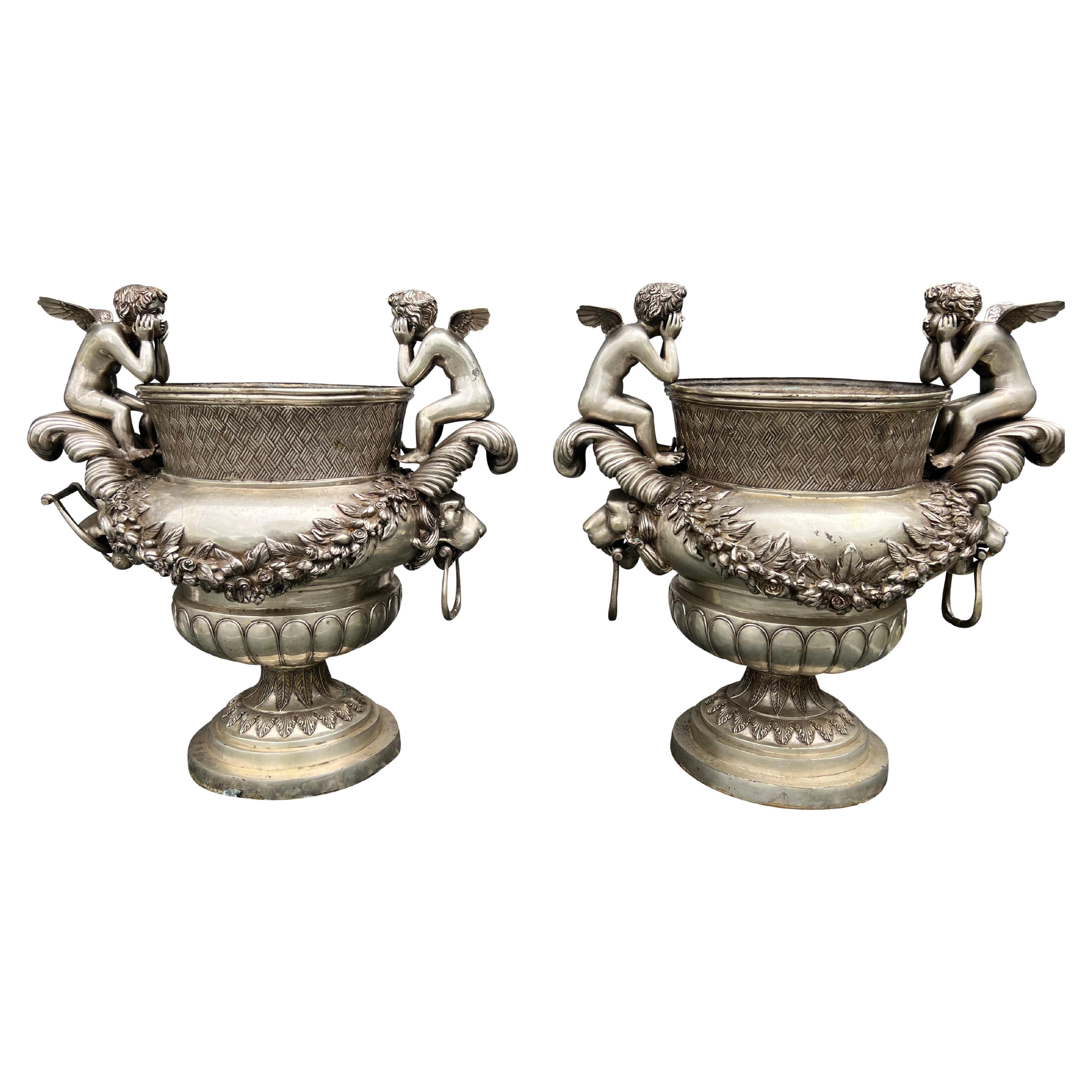 Pair Of Classical Style Silvered Metal Garden Urns For Sale