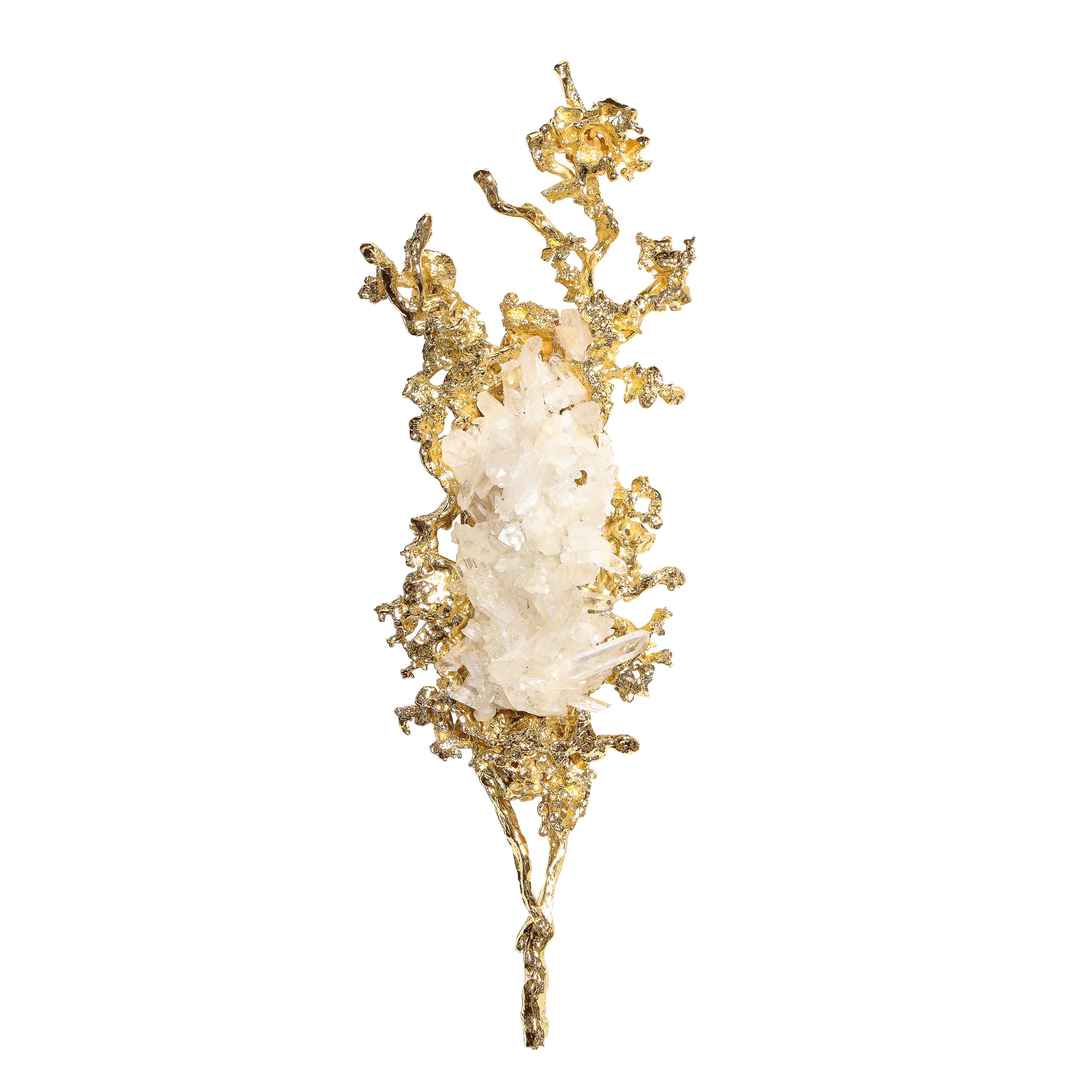 This stunning and sophisticated pair of modernist sconces were realized by the celebrated French artist Claude Boeltz. They feature graphic organic forms- recalling both oceanic and terrestrial forms from coral to tree branches- realized in exploded