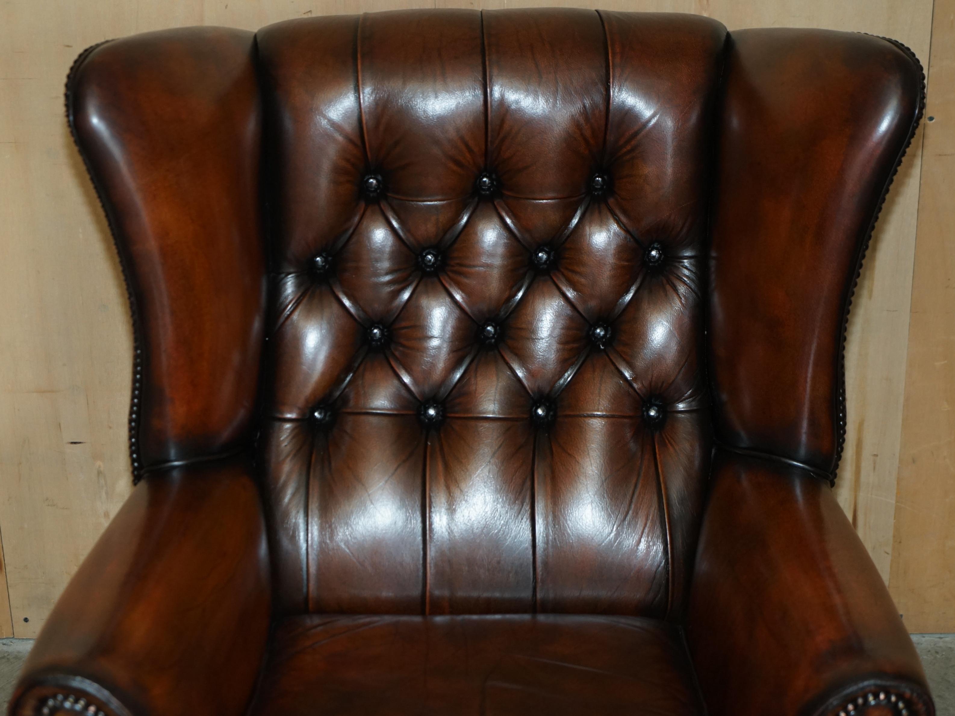 English PAIR OF CLAW & BALL FEET CHESTERFIELD TUFTED BROWN LEATHER WINGBACK ARMCHAIRs For Sale