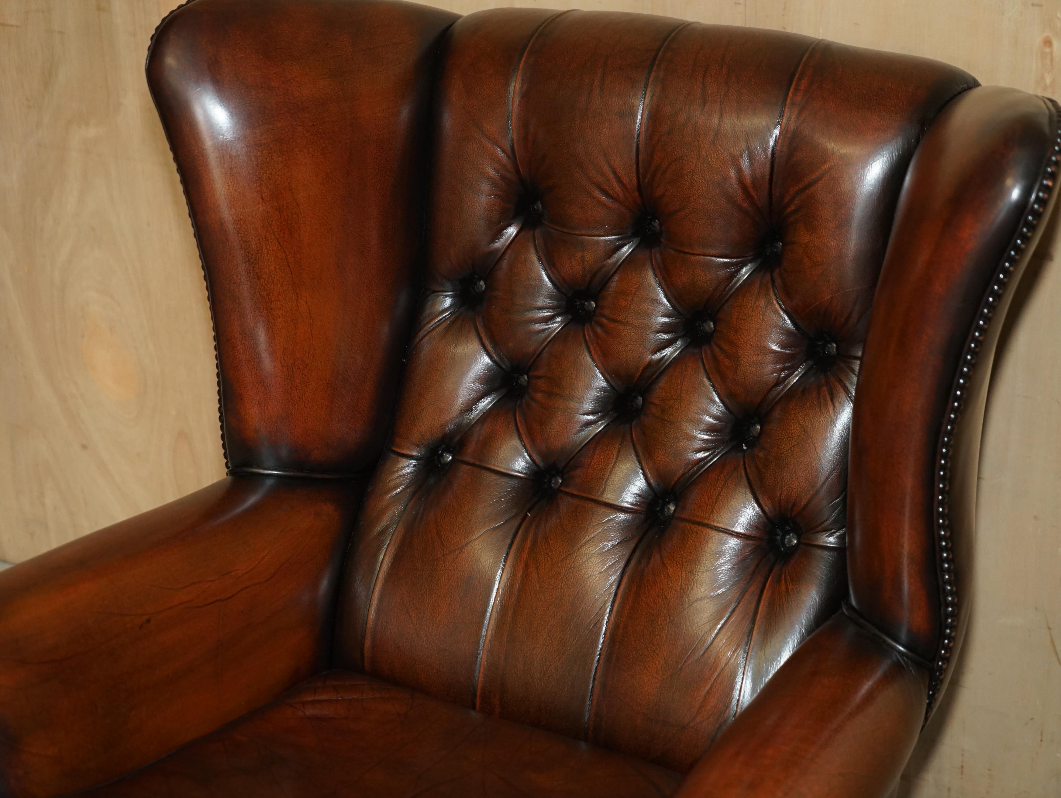 Hand-Crafted PAIR OF CLAW & BALL FEET CHESTERFIELD TUFTED BROWN LEATHER WINGBACK ARMCHAIRs For Sale
