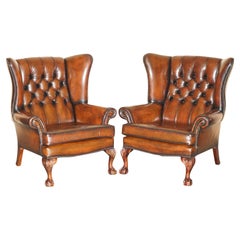par de sillones reclinables de piel marrón acolchada de claw & ball