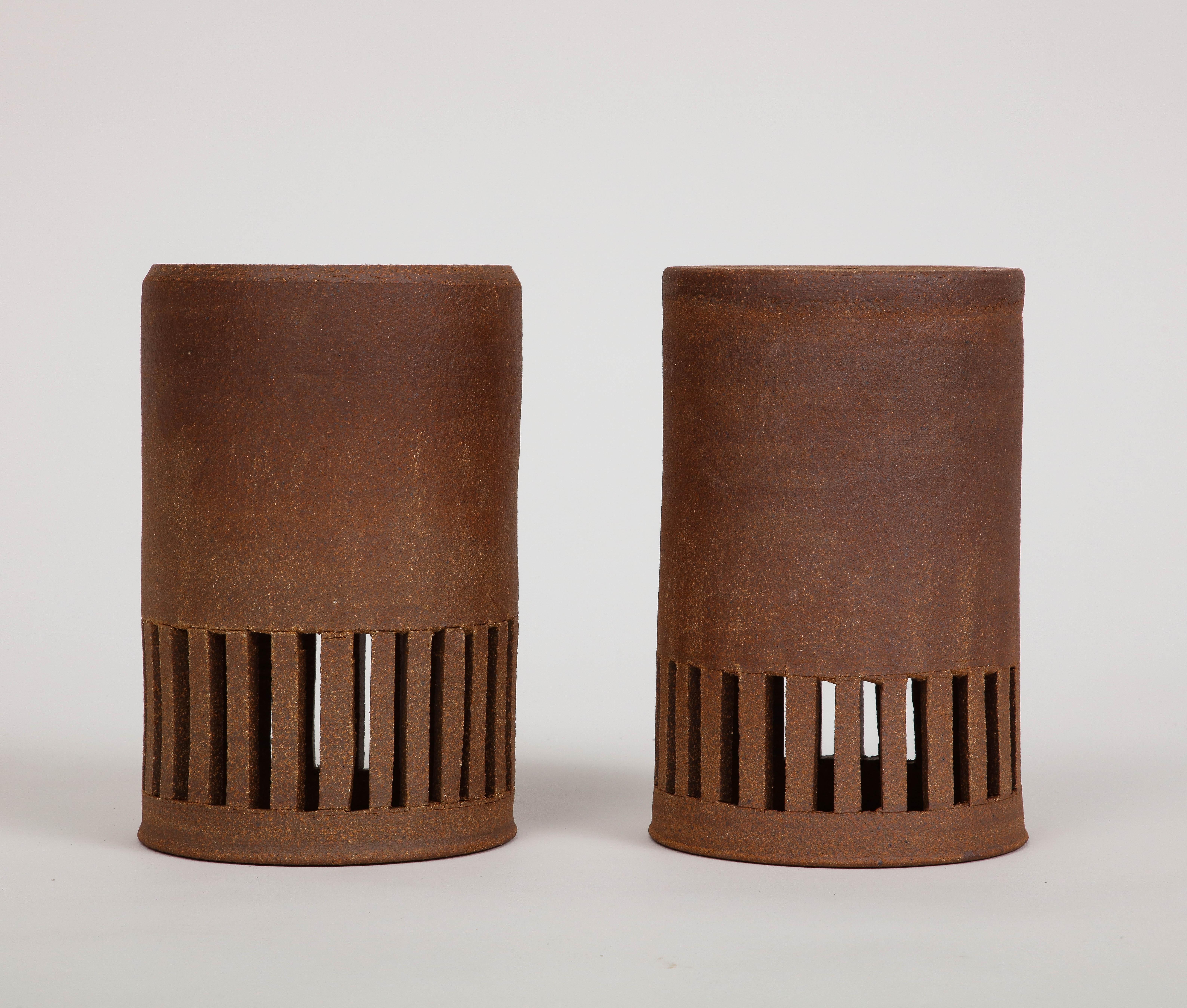 Pair of natural clay indoor/outdoor hanging cylindrical light shades by Brent J. Bennett, US. Made in 2022. 

*These are shades only, no lighting elements are included. Customize with your own cable/socket fitting!