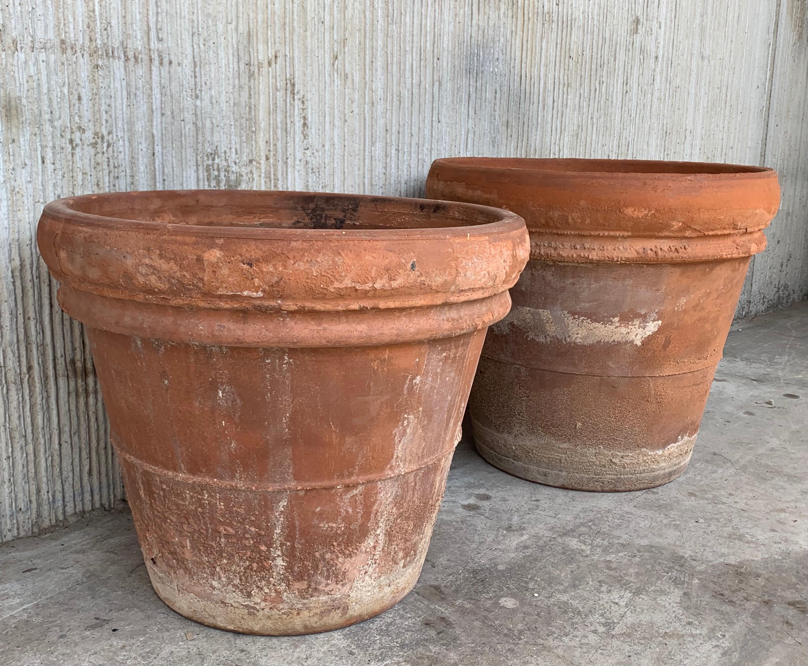 Pair of clay planters from Spain.