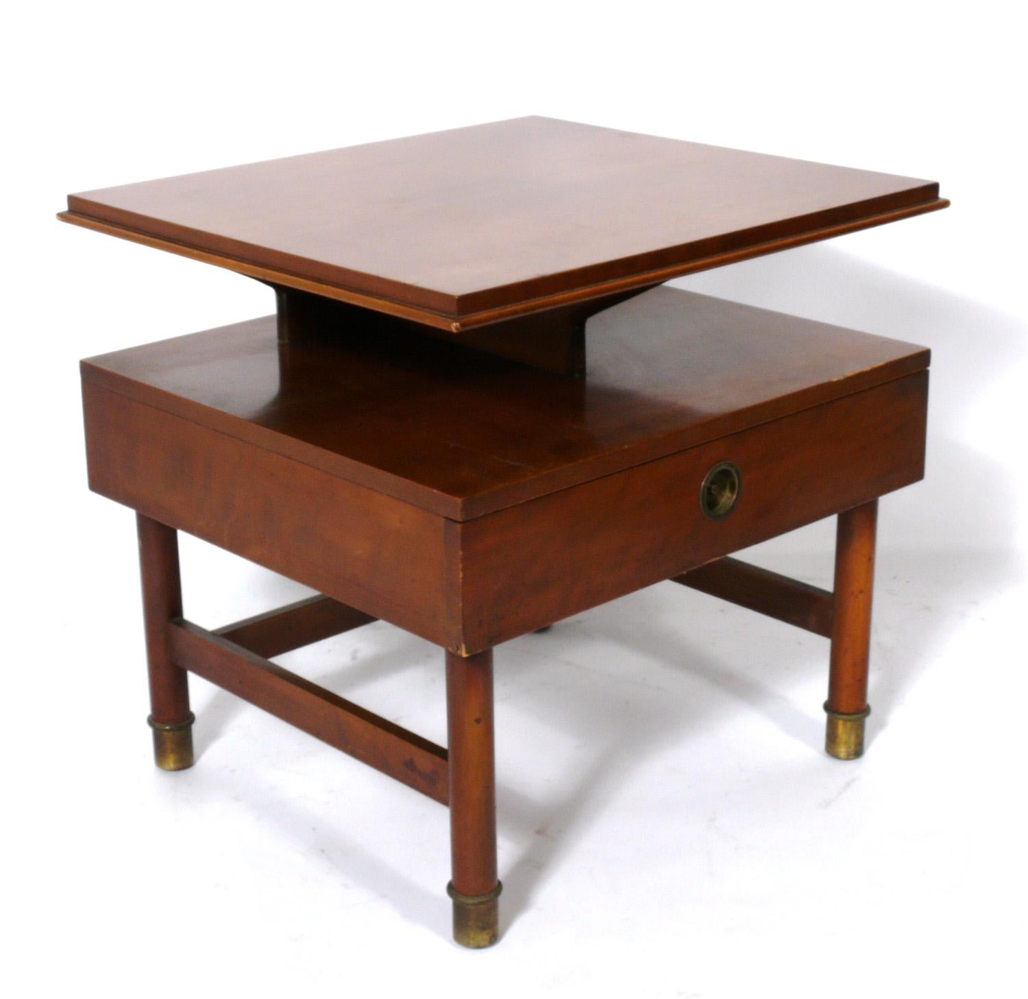Pair of clean lined nightstands or end tables, designed by Renzo Rutili for Johnson Furniture, American, circa 1950s. They are a versatile size and can be used as end or side tables, or as night stands. They are currently being refinished, and can