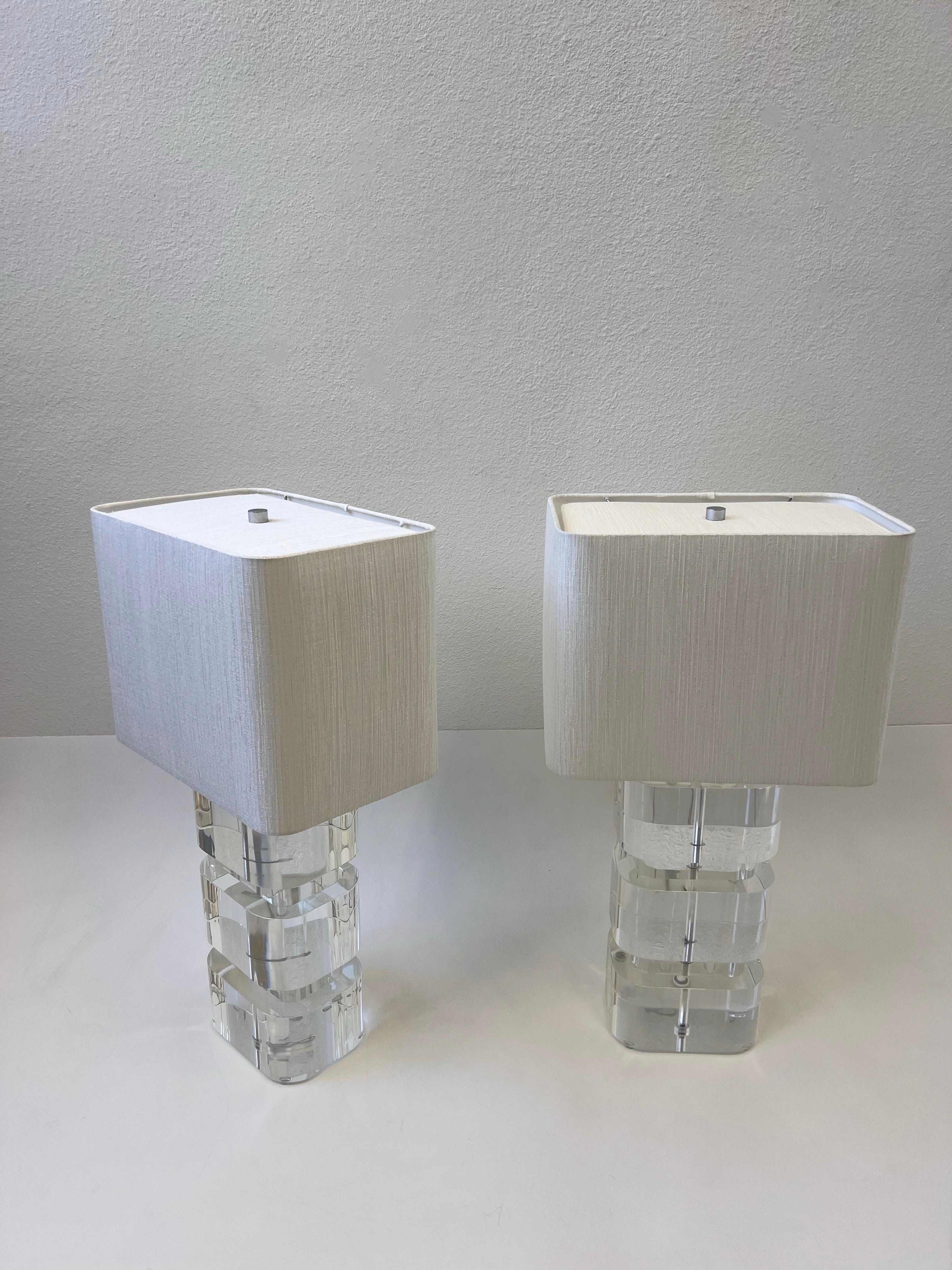 Polished Pair of Clear Acrylic and Chrome Table Lamps by Karl Springer  For Sale