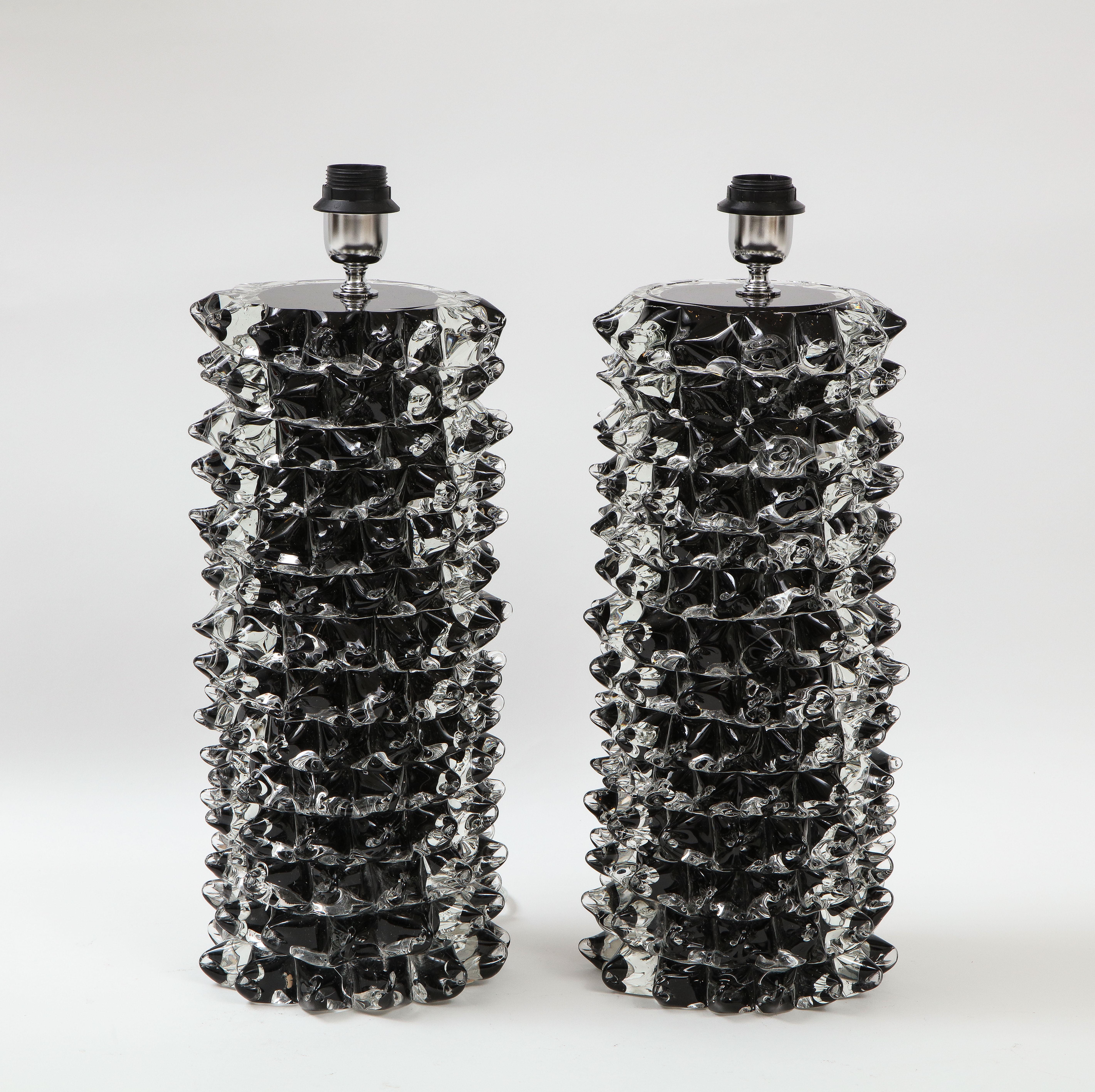 Dramatic Handblown pair of clear and black Murano glass lamps in the iconic manner of the 
