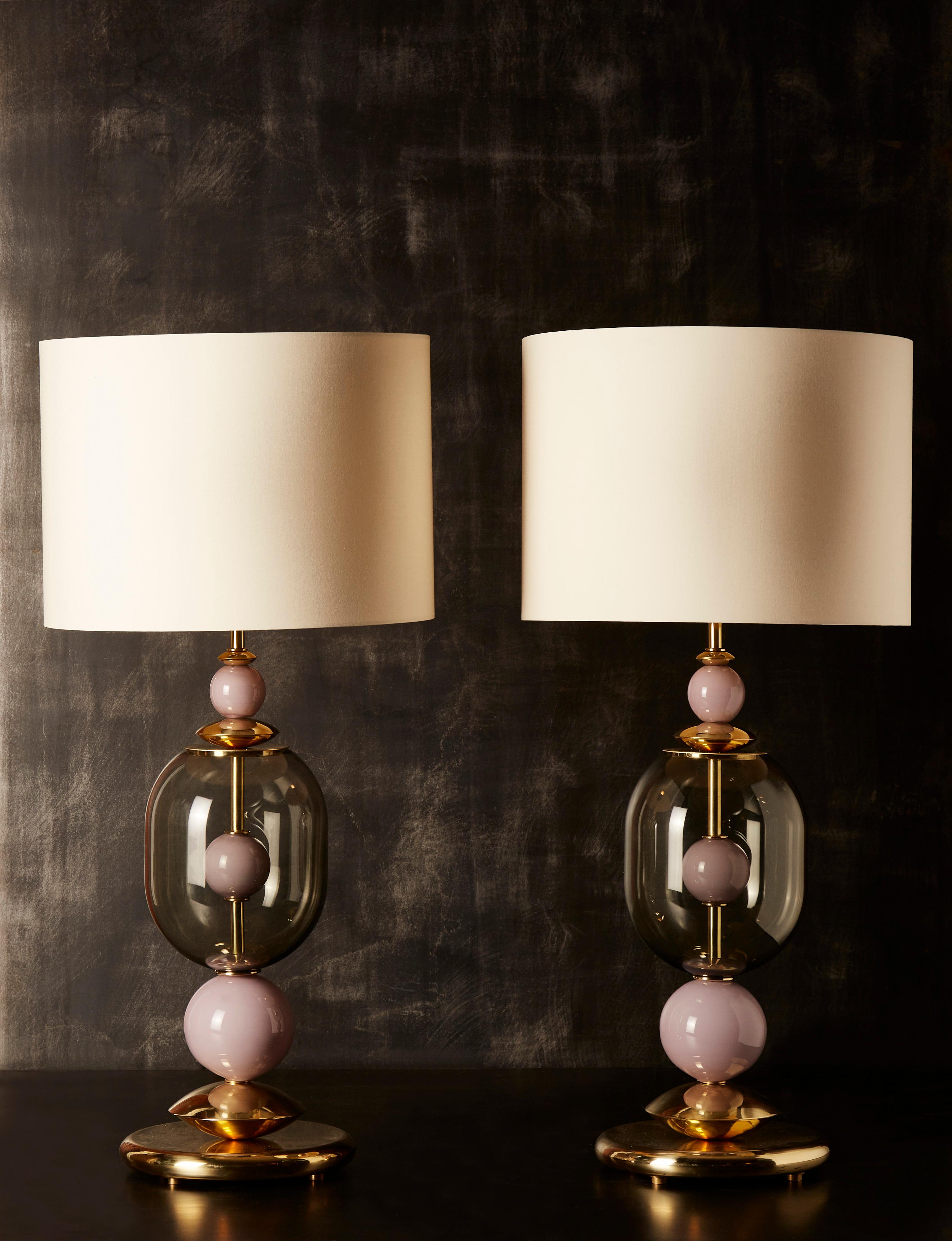 Pair of exquisite table lamps made of brass foot and central stem, brass inserts and dust pink Murano glass balls.
