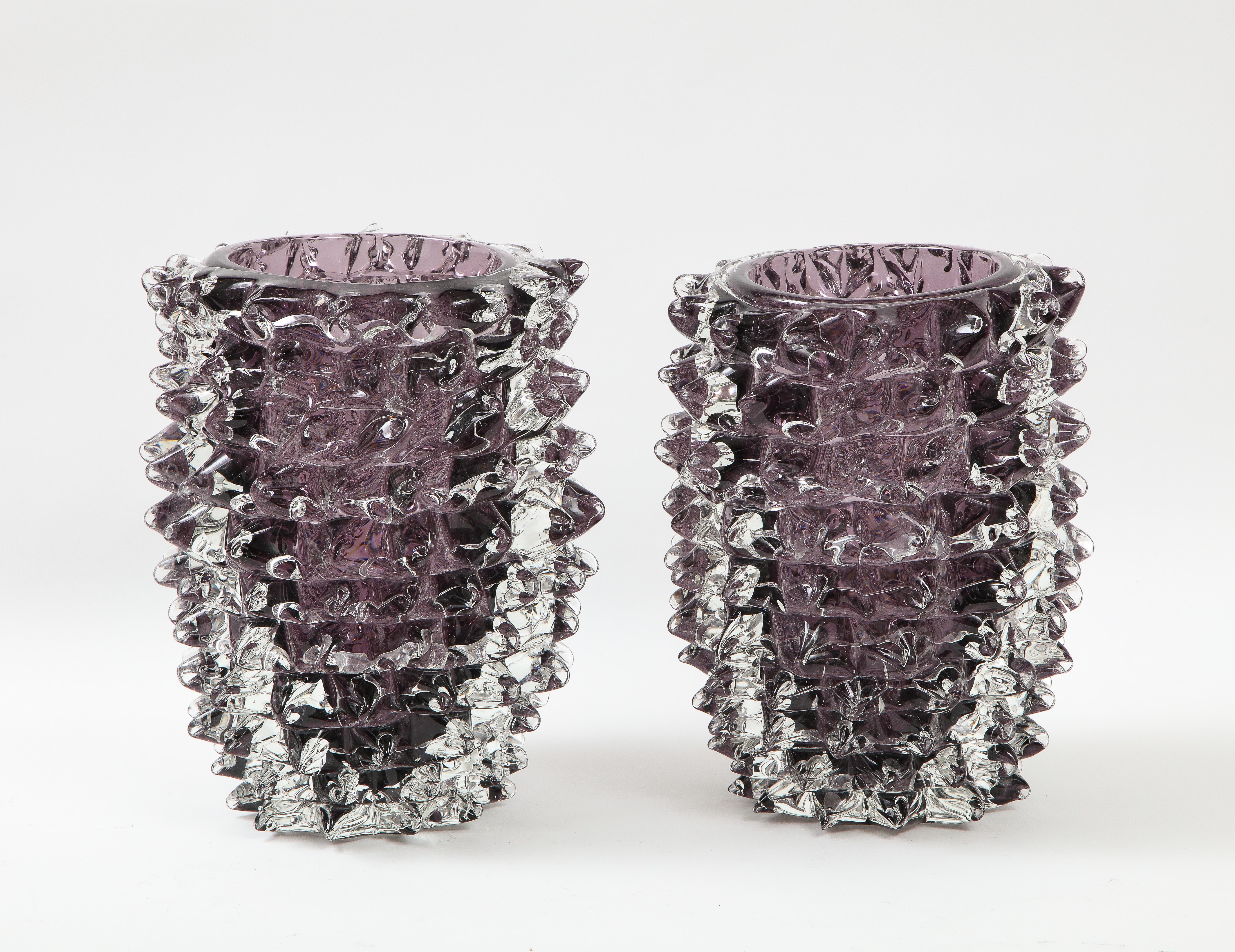 Handblown pair of clear and Amethyst or purple Murano glass vases in the iconic manner of the 