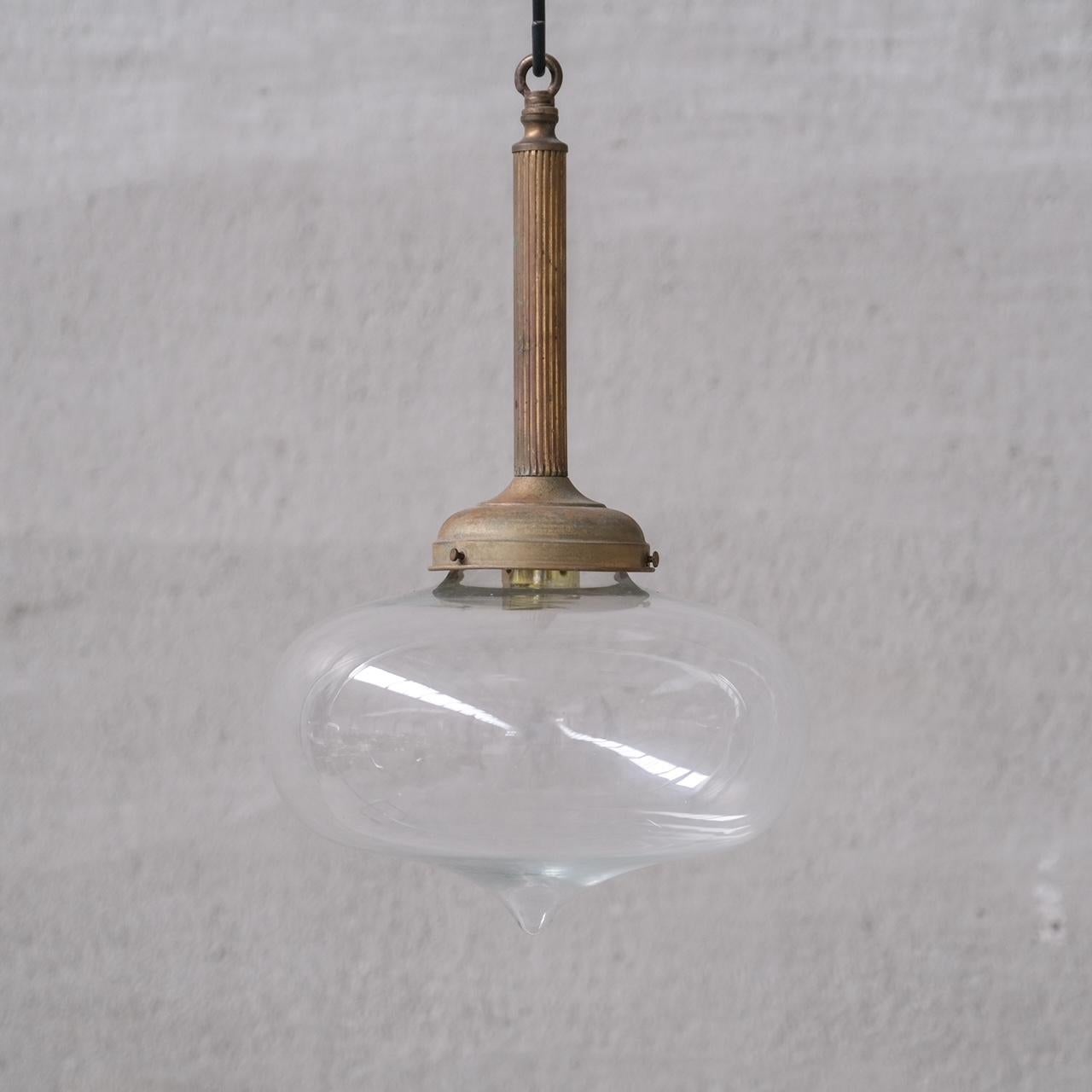 French Pair of Clear Glass and Brass Mid-Century Teardrop Pendant Lights For Sale