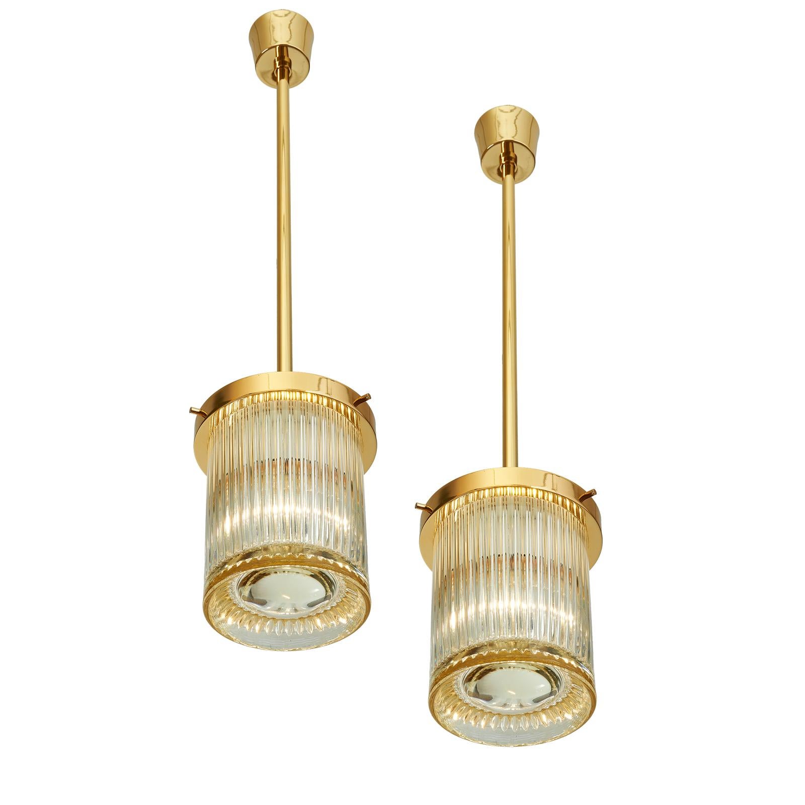 Pair of Clear Ribbed Glass Lanterns with Central Oculus Lens For Sale 1