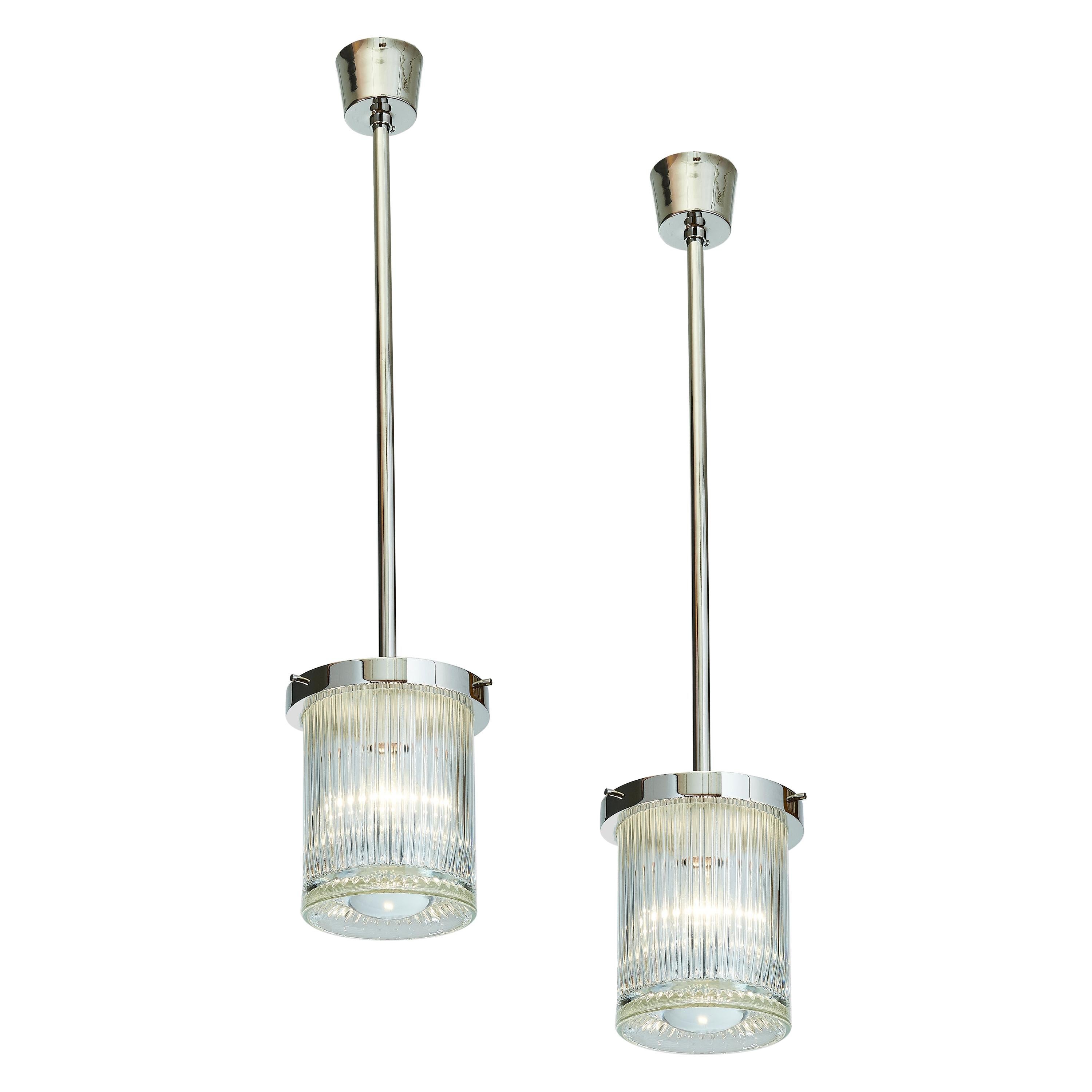 Pair of Clear Ribbed Glass Lanterns with Central Oculus Lens For Sale